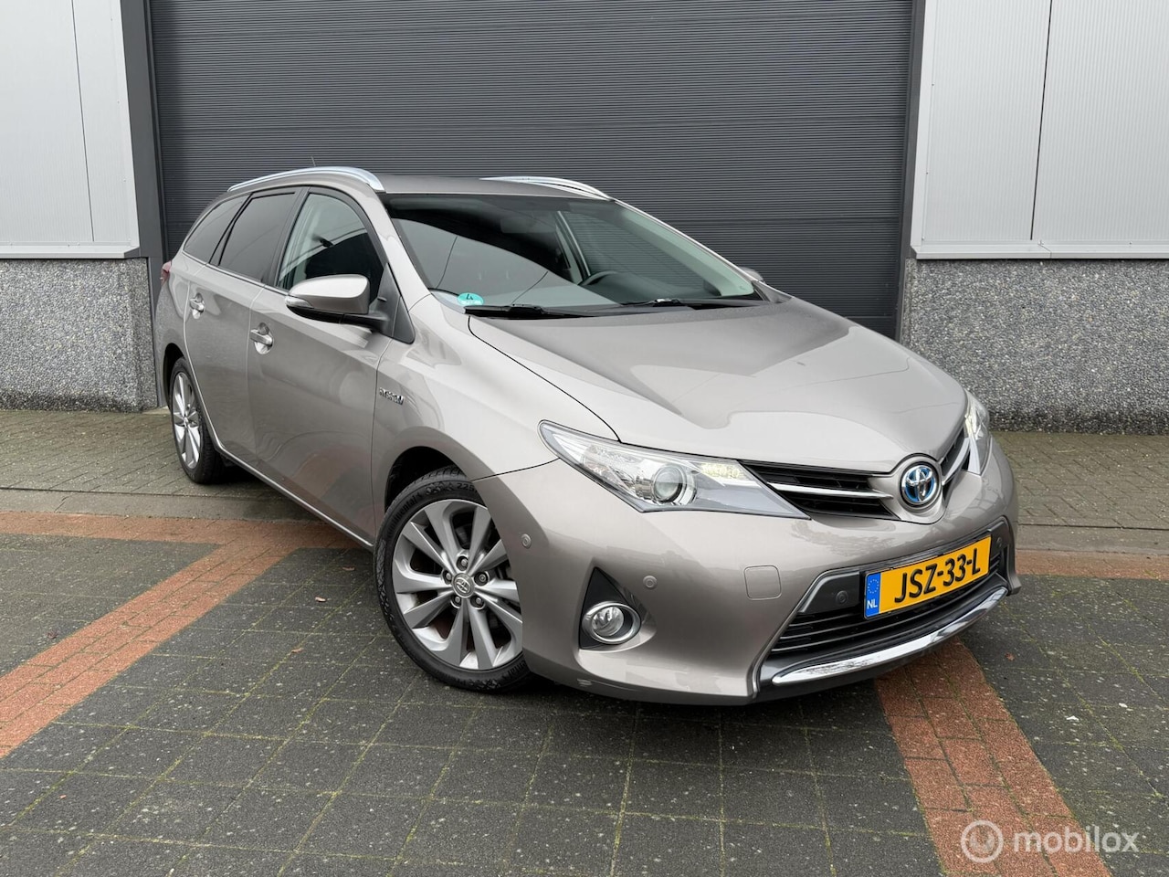 Toyota Auris - 1.8 Hybrid Executive 1.8 Hybrid Executive - AutoWereld.nl