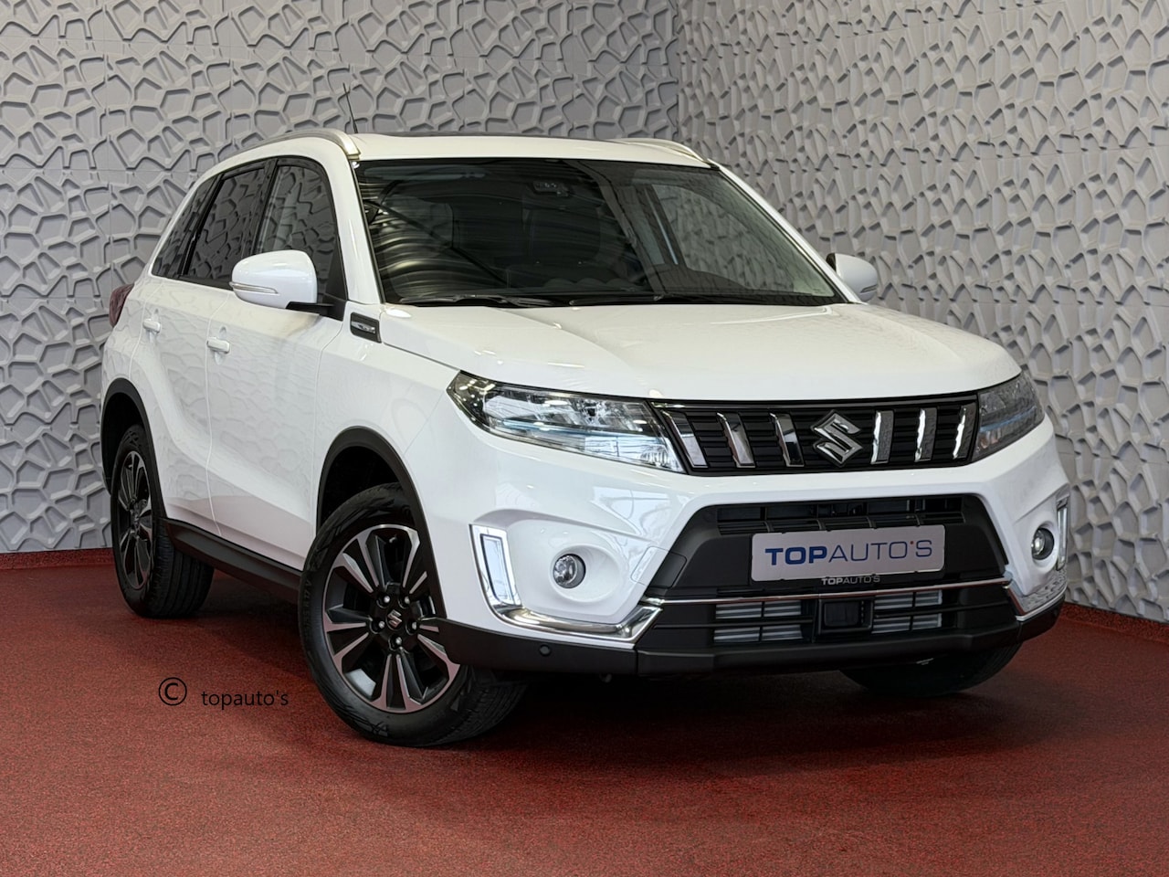 Suzuki Vitara - 1.4 BOOSTERJET HYBRID SMART HYBRID STYLE PANORAMA SCHUIFDAK LEER CARPLAY NAVI CAMERA PDC S - AutoWereld.nl