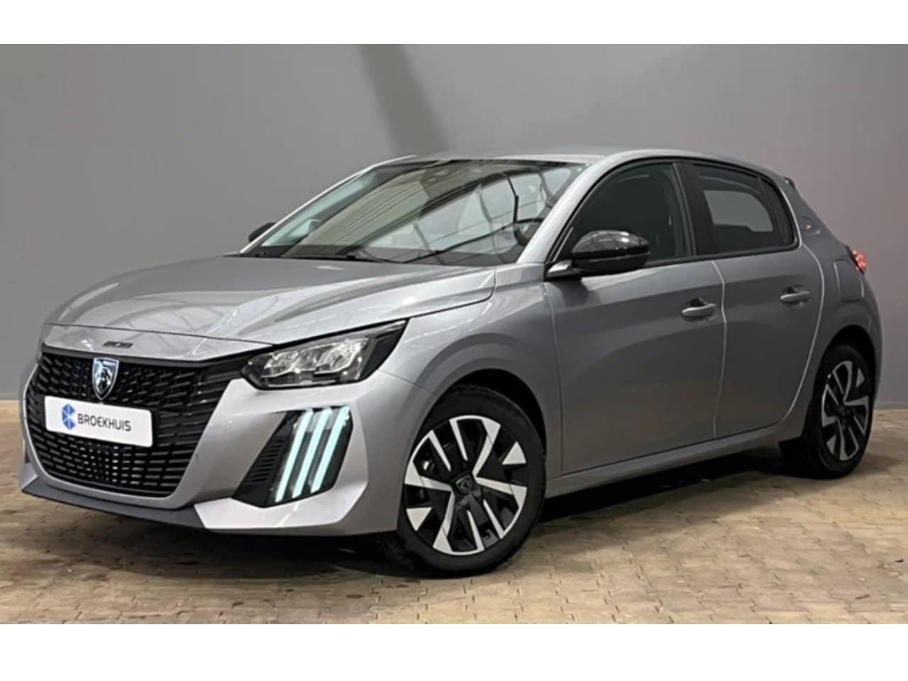 Peugeot 208 - Style | Dashboard en deurpanelen in kunststof met carboneffect | Ecoled koplampen | Elektr - AutoWereld.nl