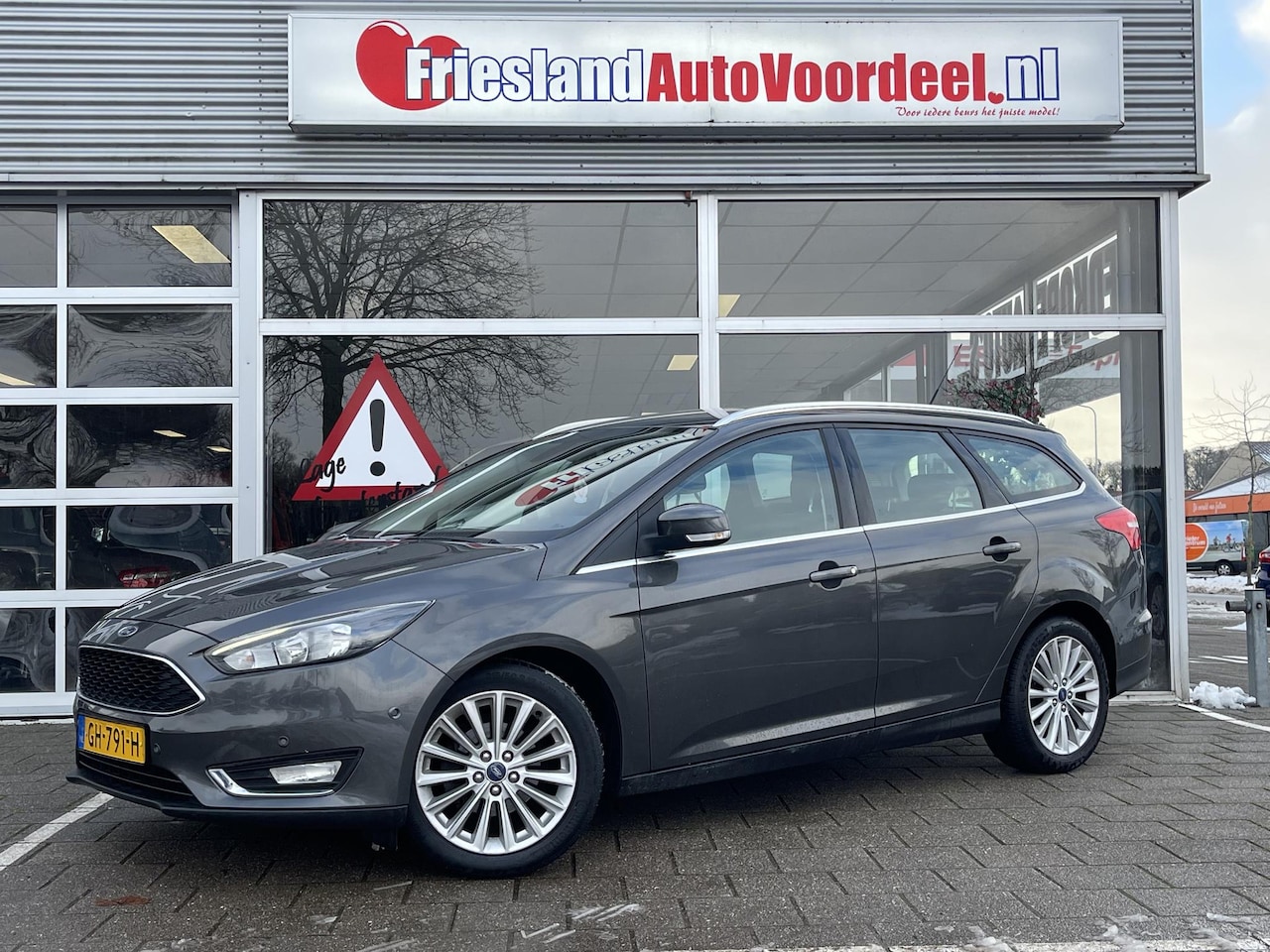 Ford Focus Wagon - 1.0 First Edition /Cruise/Clima/Navi/2015/APK 01-2027/ - AutoWereld.nl