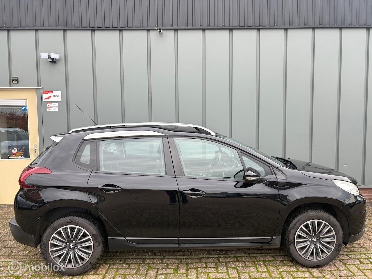 Peugeot 2008 - 1.6 BlueHDi CLIMA//NAVI//CRUISE//TREKHAAK//PDC//ELEC.RAMEN