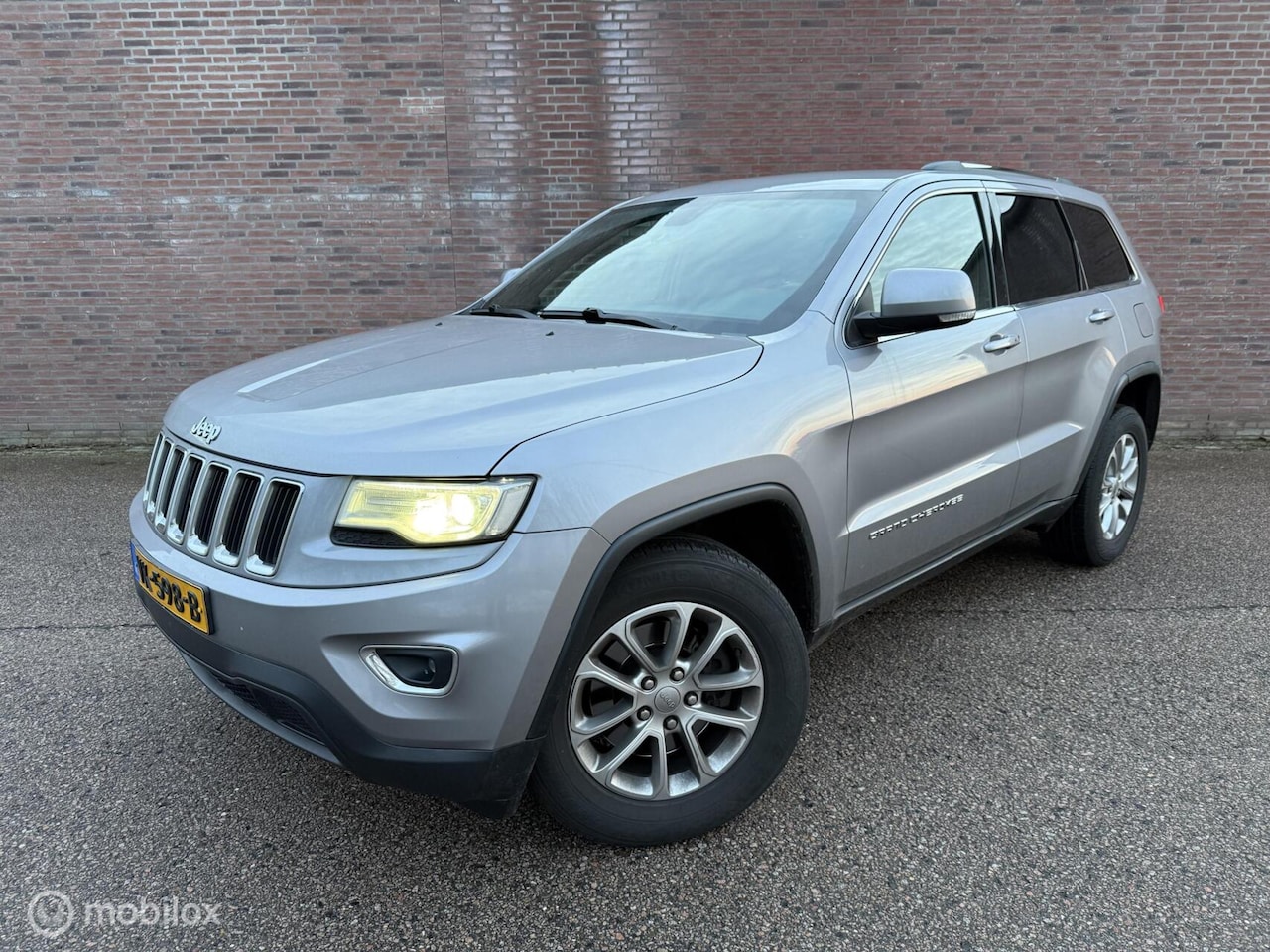 Jeep Grand Cherokee - 3.0 CRD Laredo | Leer | Trekhaak | Marge - AutoWereld.nl