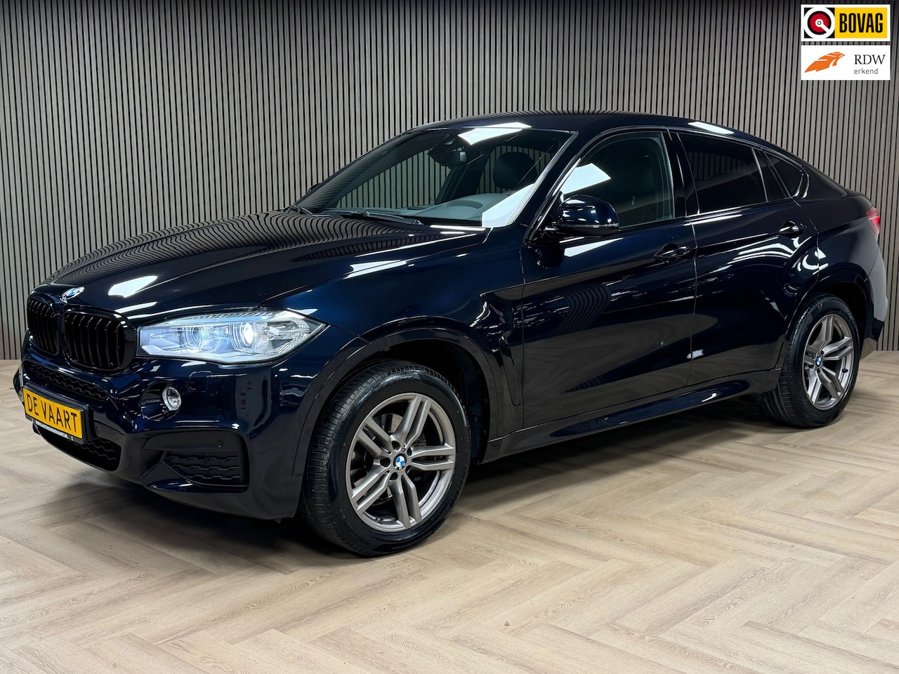 BMW X6 - XDrive30d High Executive AUT. NAVIGATIE CAMERA CRUISE LEDER STOELVERWARMING KEYLESS-GO PDC - AutoWereld.nl
