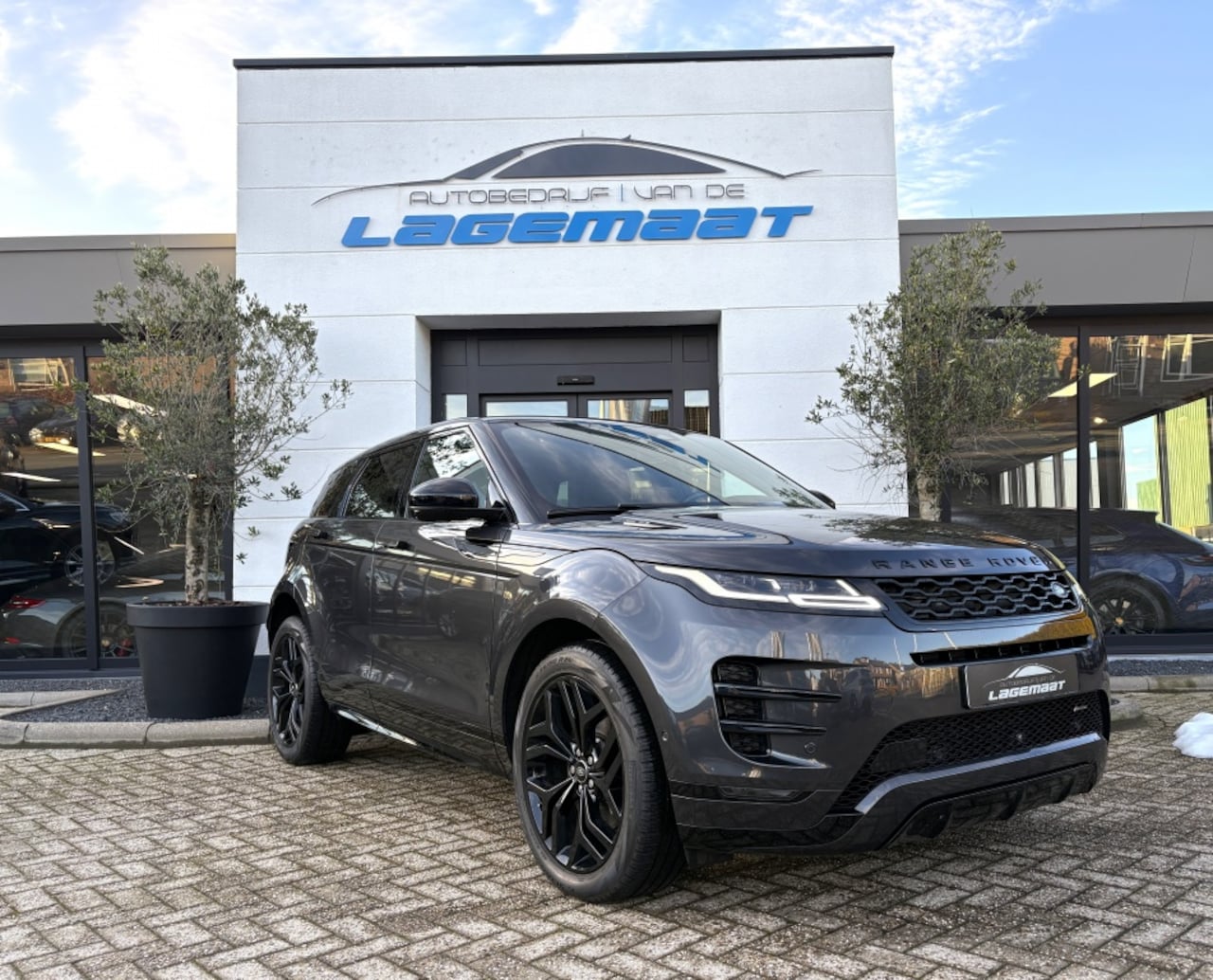 Land Rover Range Rover Evoque - 1.5 P300e AWD R-Dynamic Pano | Meridian | Trekhaak | - AutoWereld.nl