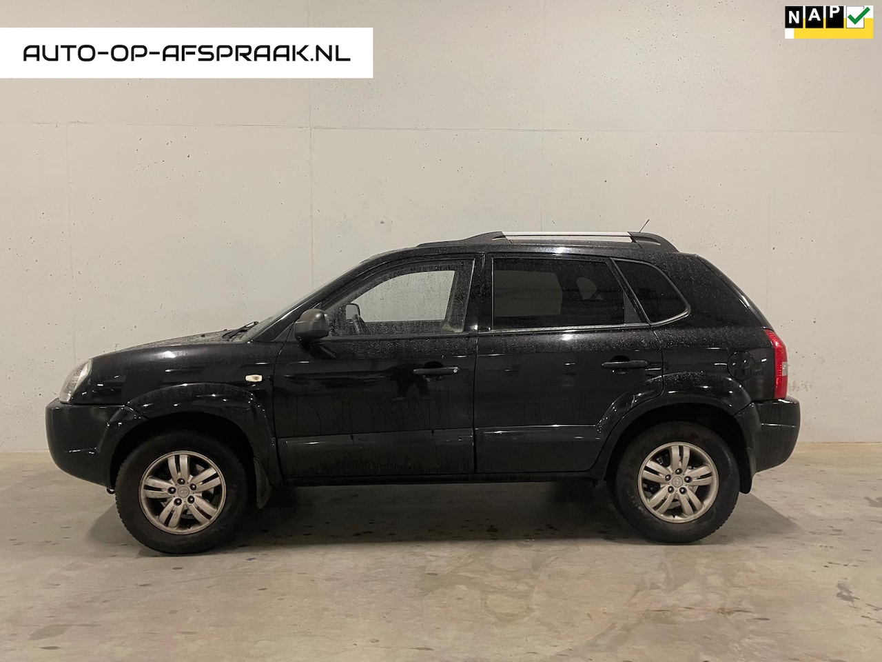 Hyundai Tucson - 2.0i Dynamic Executive Trekhaak Cruise C. Airco - AutoWereld.nl
