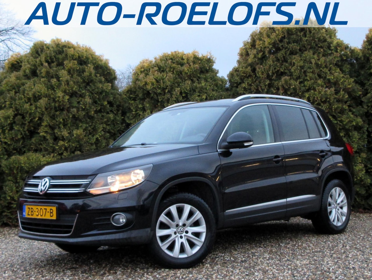 Volkswagen Tiguan - 1.4 TSI Sport&Style*Navi*Cruise*Pdc* - AutoWereld.nl