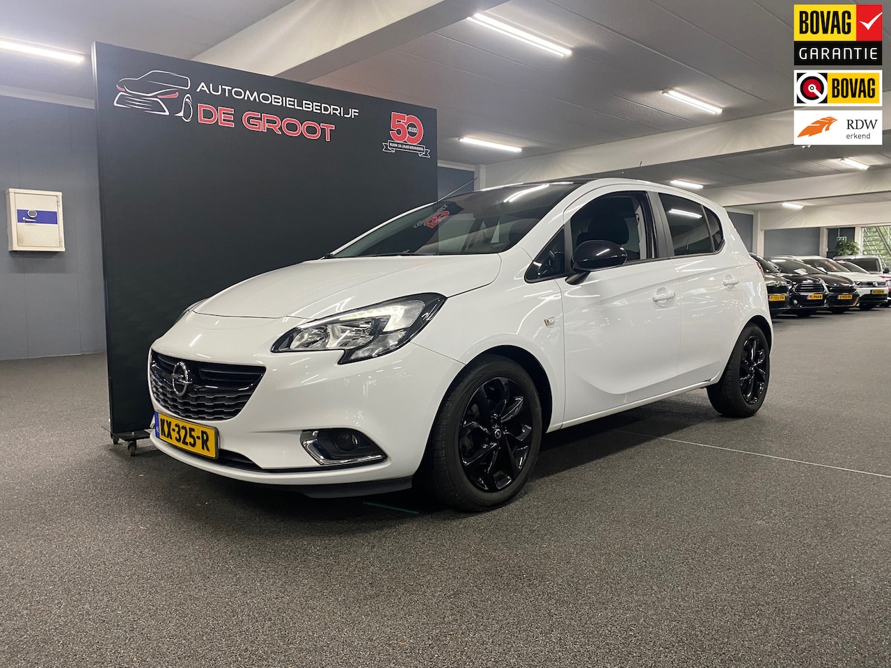 Opel Corsa - 1.4 Bi-Fuel Business+/ Verwarmde voorstoelen/ Stuurwiel verwarmd/ Airco/ Cruise control - AutoWereld.nl