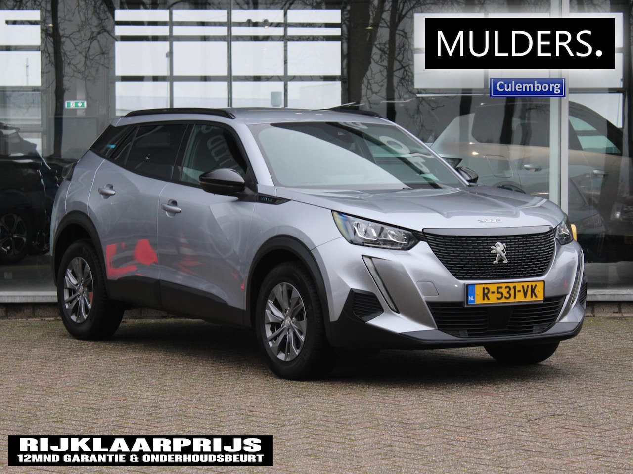 Peugeot 2008 - 1.2 PureTech Style | Camera / Climate / Navi - AutoWereld.nl