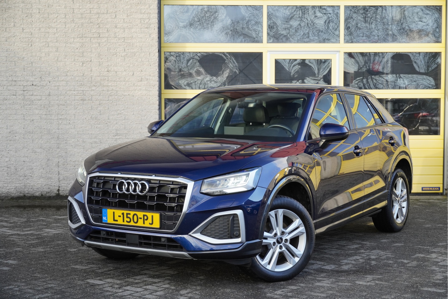 Audi Q2 - 35 TFSI 150PK! Business Edition BJ2021 Lmv 17" | Led V+A | Pdc | Navi | Afneembare trekhaa - AutoWereld.nl