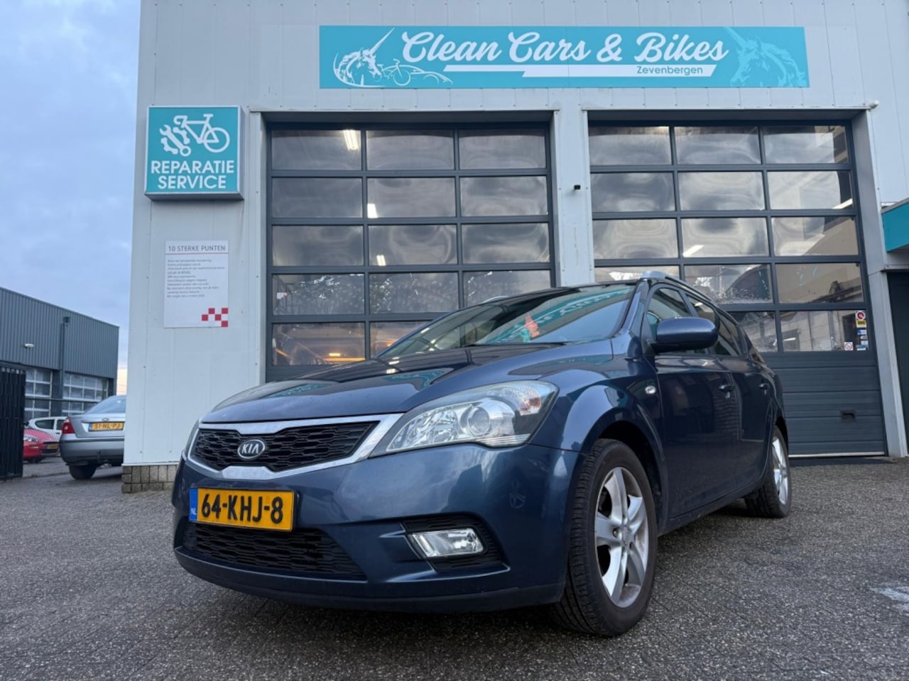 Kia Cee'd Sporty Wagon - 1.4 CVVT X-ecutive 1.4 CVVT X-ecutive - AutoWereld.nl
