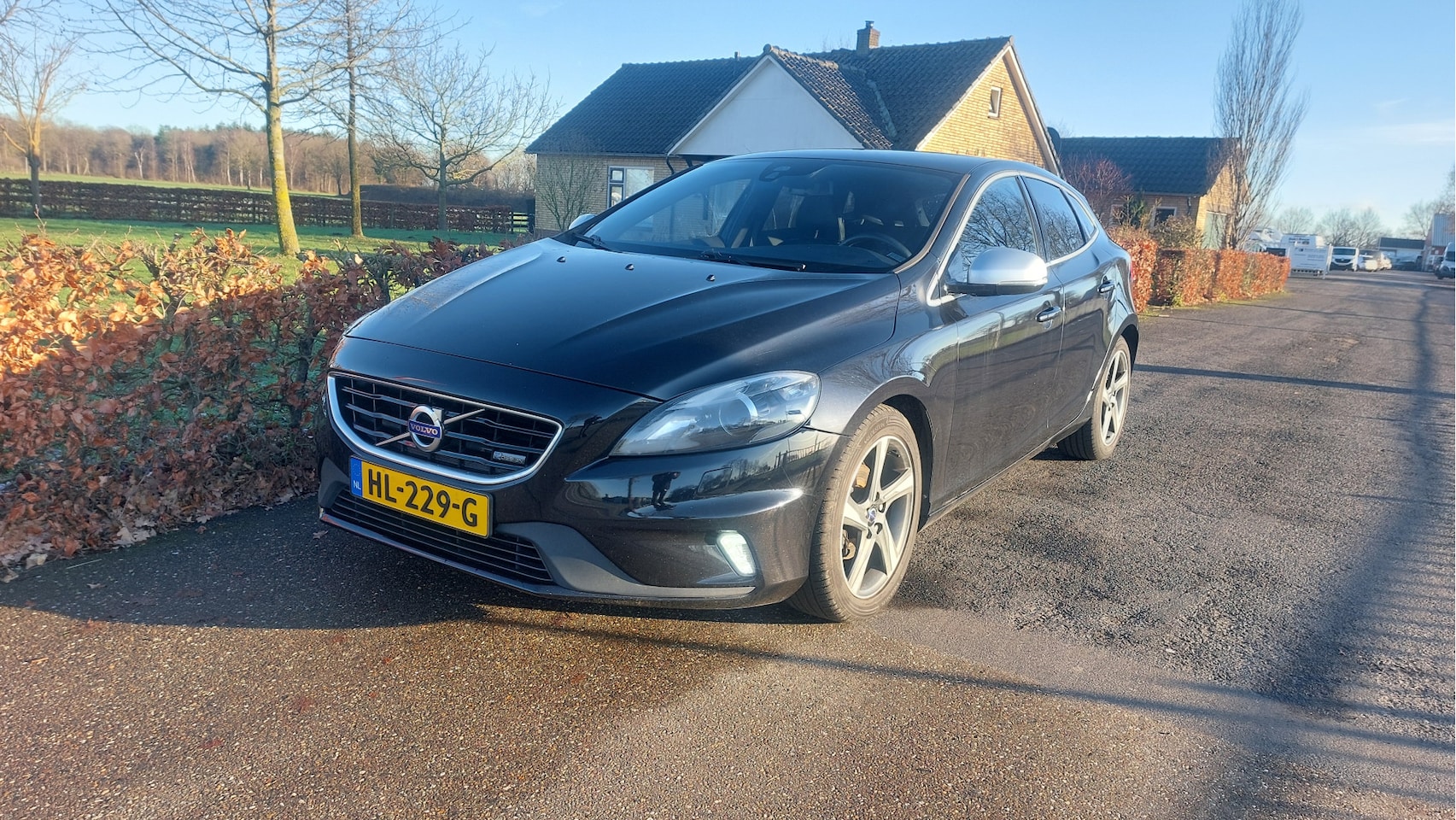 Volvo V40 - 1.6 D2 Summum R-design AIRCO/NAVI BJ 2014 - AutoWereld.nl