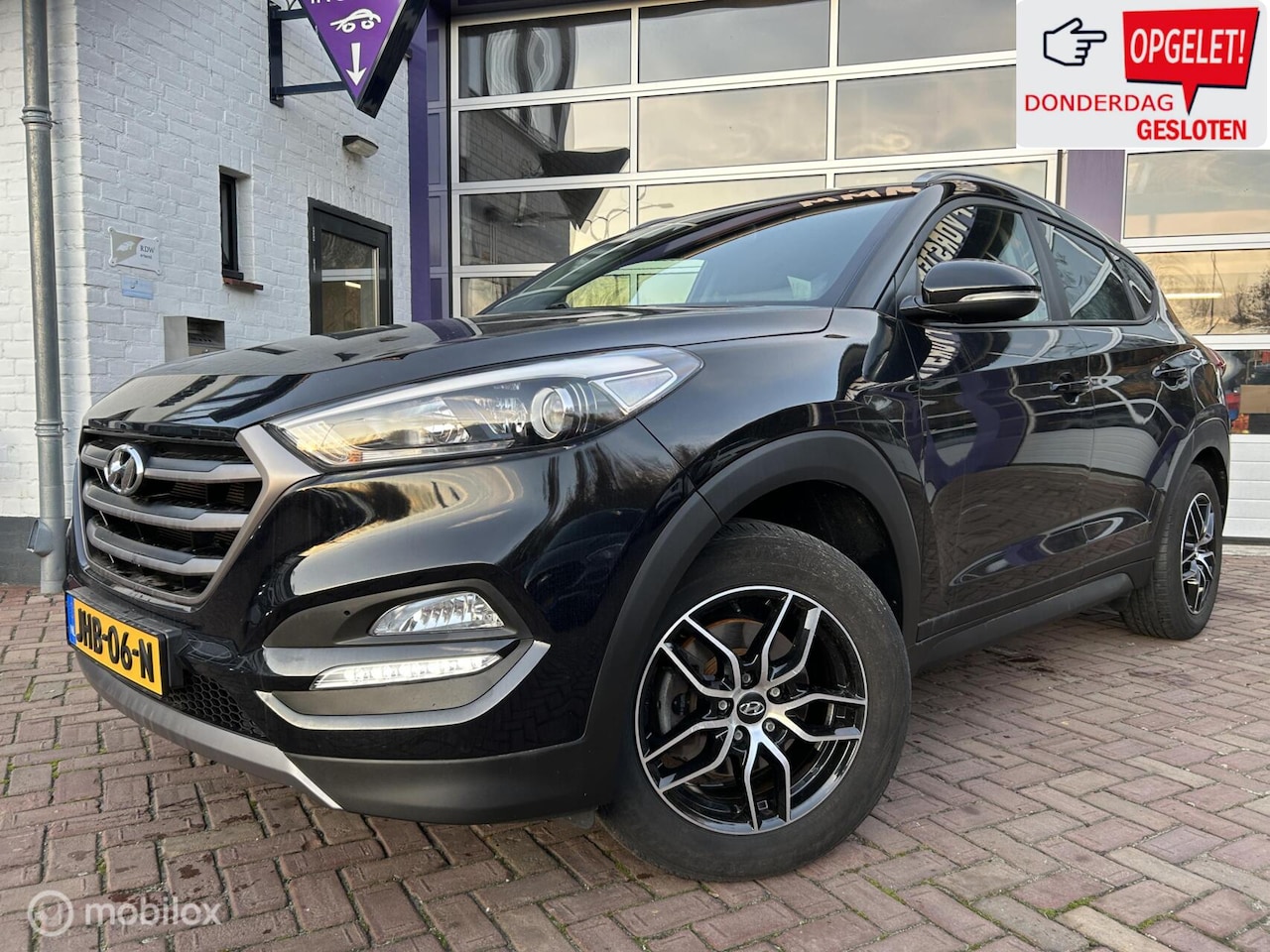 Hyundai Tucson - 1.6 GDi i-Motion * LPG G3 * NAVIGATIE * LM * - AutoWereld.nl