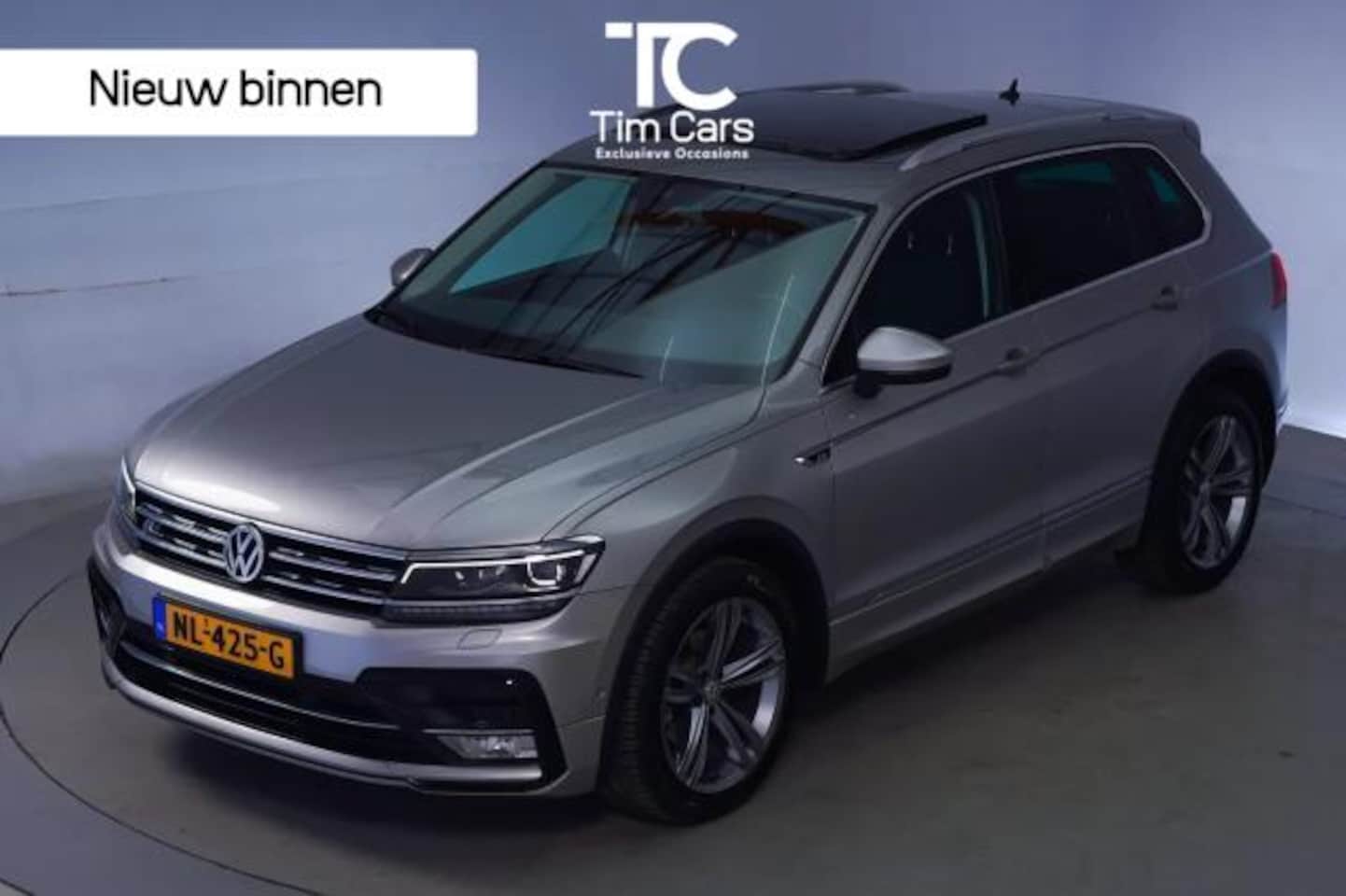 Volkswagen Tiguan - 1.4 TSI R-line Automaat | Panoramadak | LED verlichting adaptief | Stoelverwarming | Ergo - AutoWereld.nl