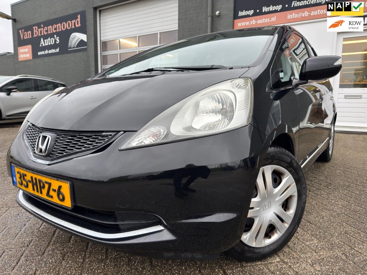 Honda Jazz - 1.4 Comfort 5 drs van 2de Eigenaar met airco en cruise controle - AutoWereld.nl