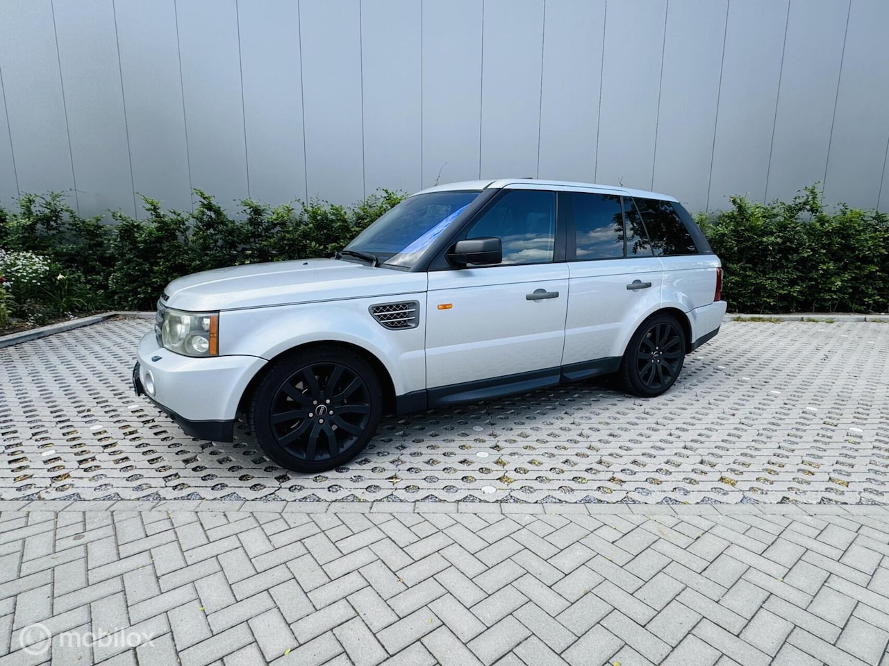 Land Rover Range Rover Sport - 4.2 V8 Supercharged 4.2 V8 Supercharged - AutoWereld.nl
