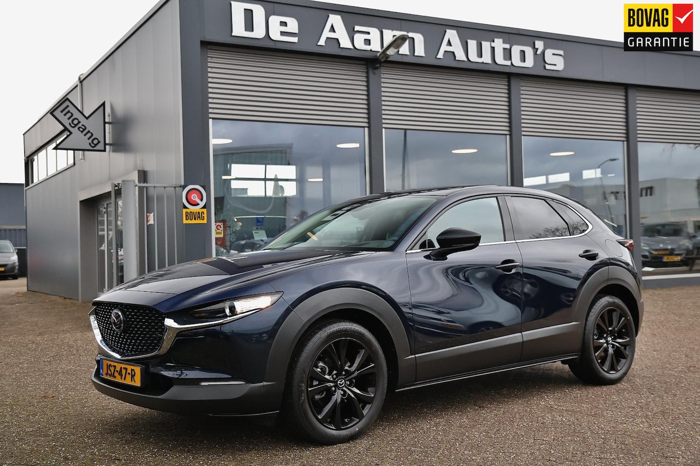 Mazda CX-30 - 2.5 e-SkyActiv-G M Hybrid Homura Headup Camera - AutoWereld.nl