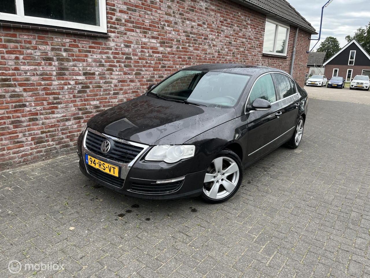 Volkswagen Passat - 1.6 FSI Sportline 1.6 FSI Sportline - AutoWereld.nl