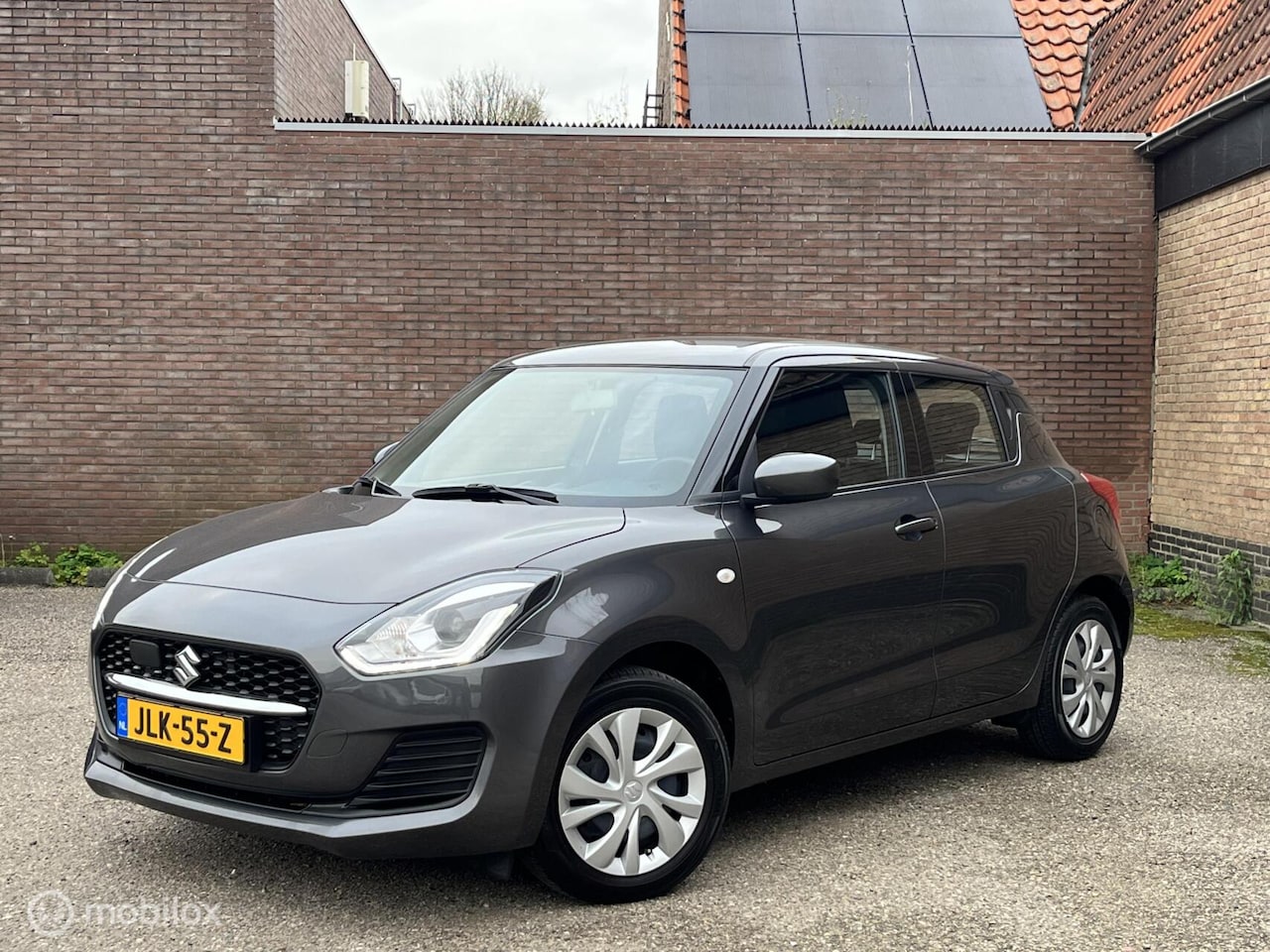 Suzuki Swift - 1.2 Comfort Smart Hybrid | Rijklaar - AutoWereld.nl