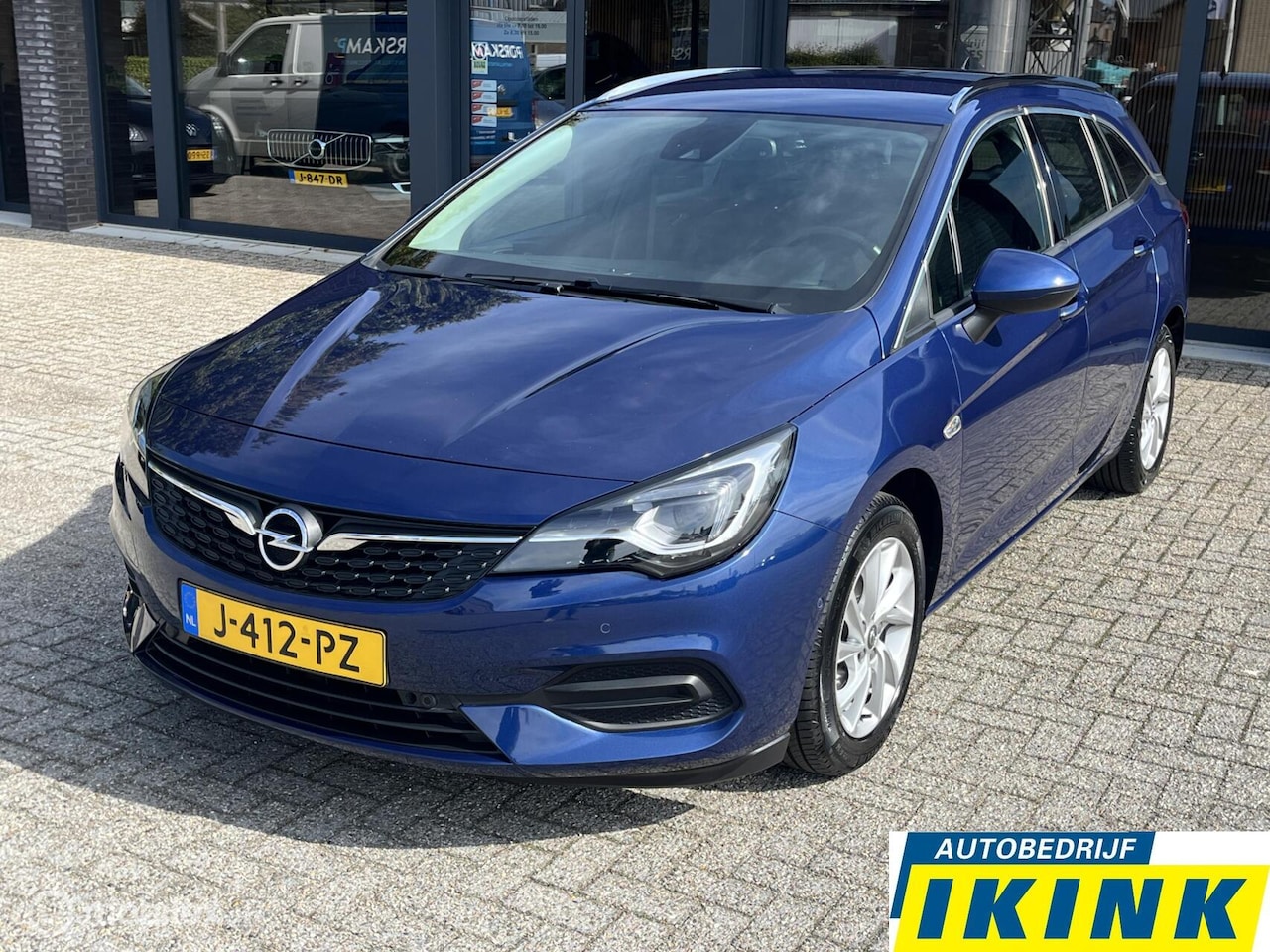 Opel Astra Sports Tourer - 1.2 Blitz Elegance | Camera, Trekhaak - AutoWereld.nl