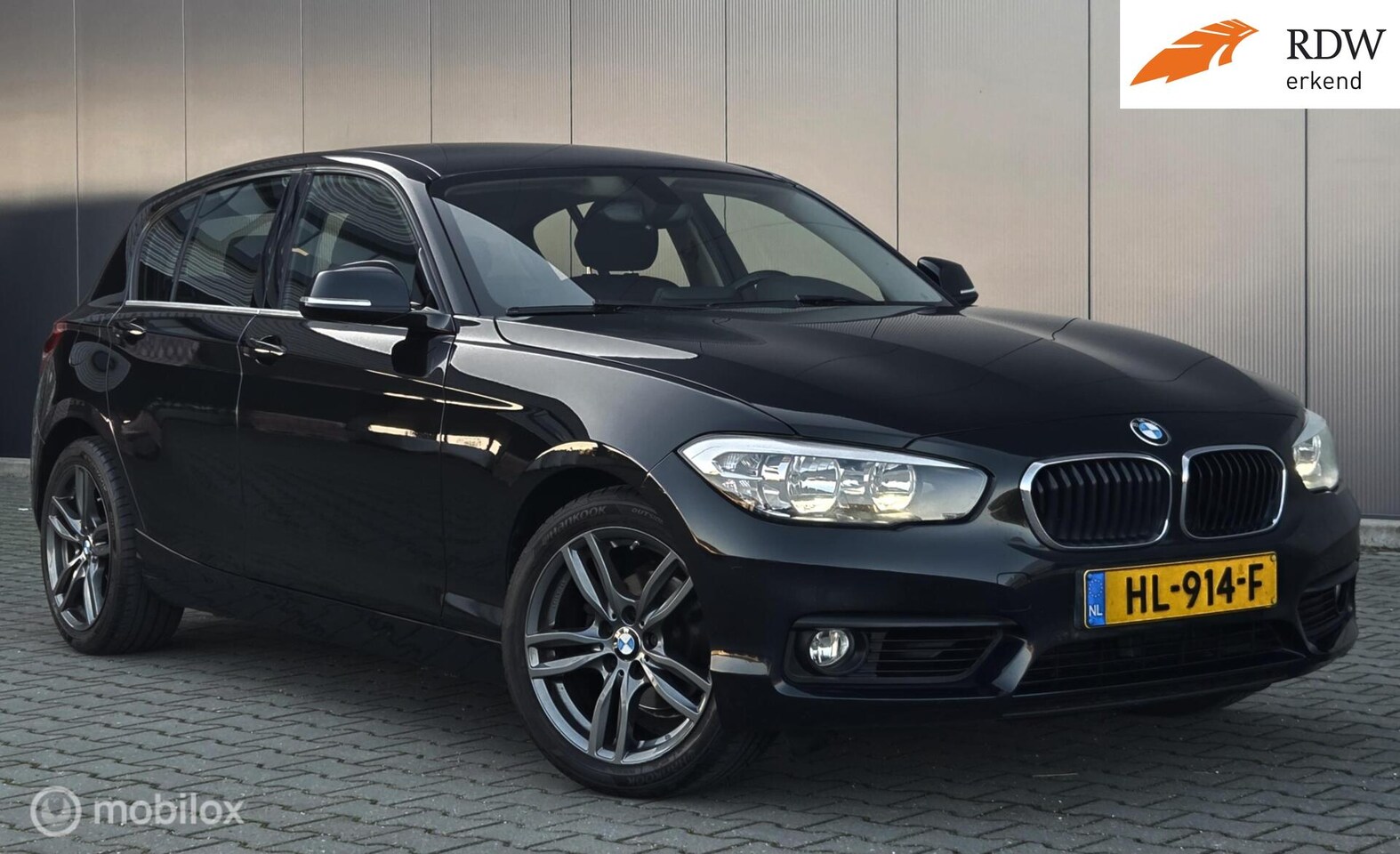 BMW 1-serie - 118i Autom Cruise Stoelverw PDC Navi Trekh IZGST - AutoWereld.nl