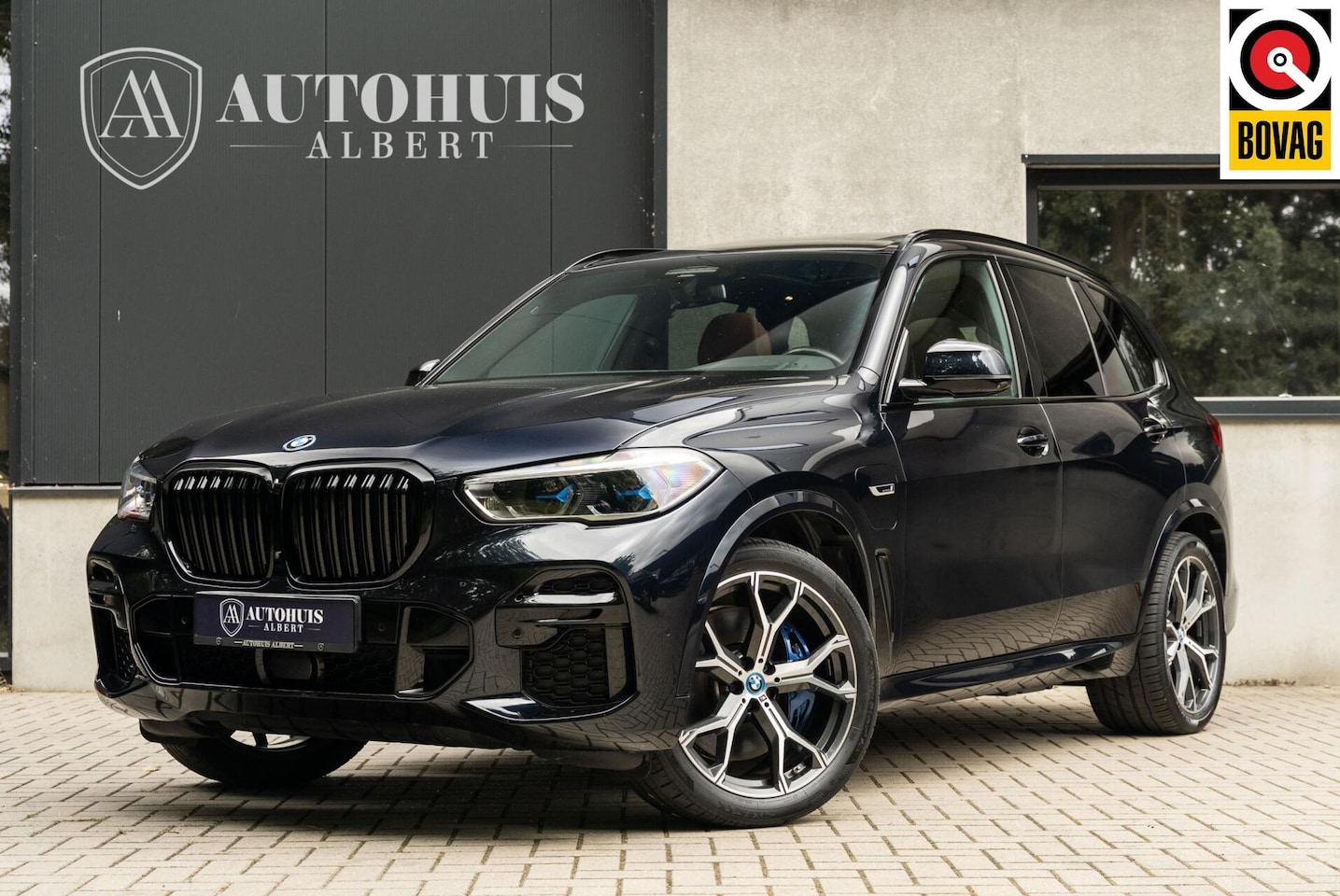 BMW X5 - xDrive45e M-Sport Massage Tartufo Night Vision 360c - AutoWereld.nl