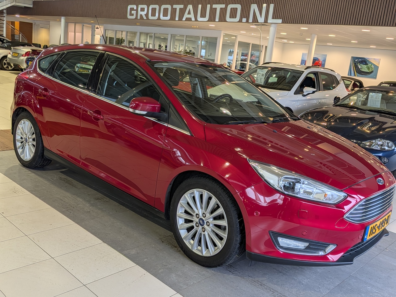 Ford Focus - 1.5 Titanium Edition Airco, Cruise Control, Trekhaak, Stuurbekrachtiging - AutoWereld.nl