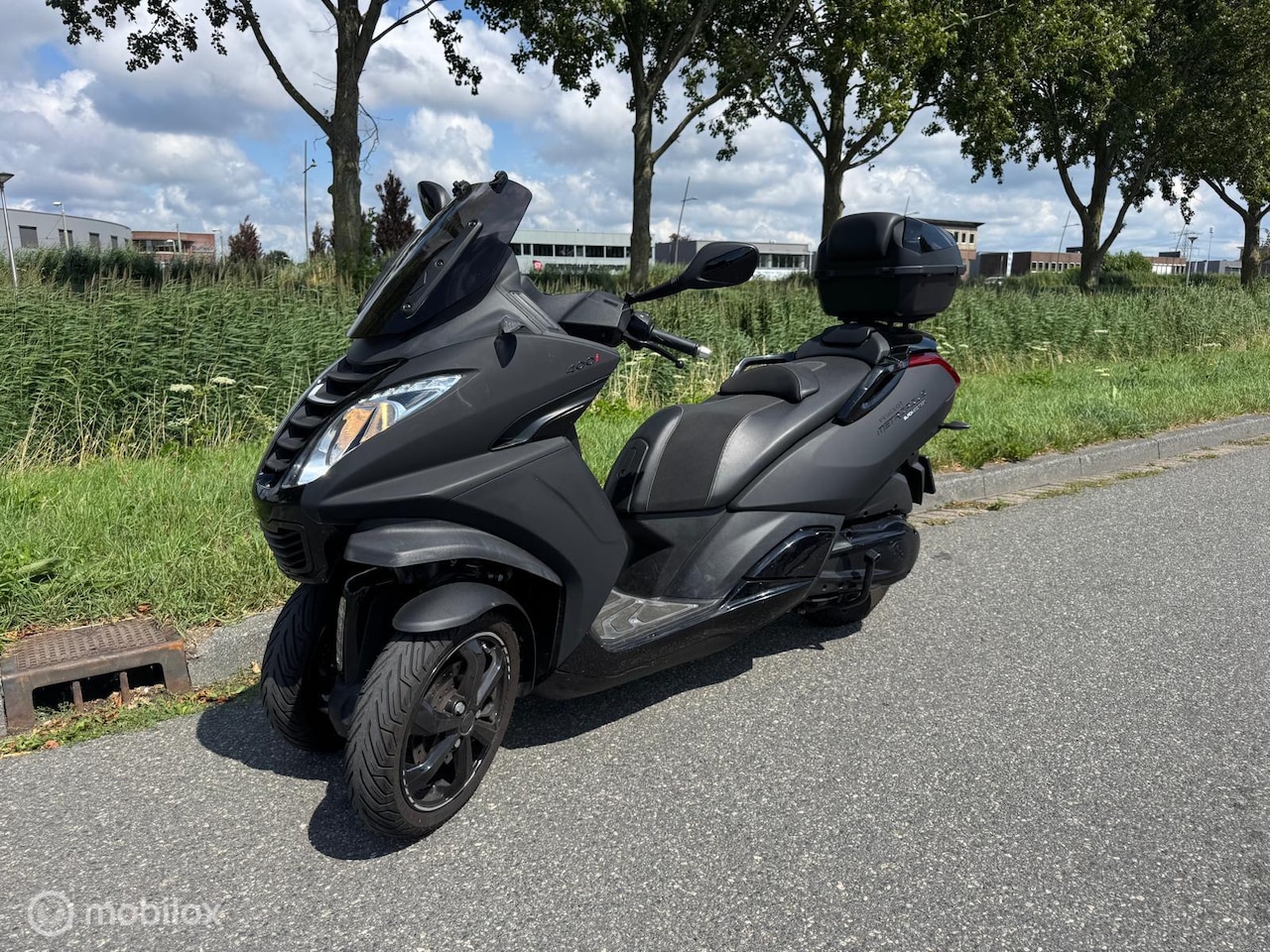 Peugeot Metropolis - X1 - AutoWereld.nl