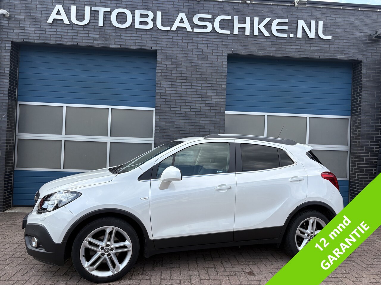 Opel Mokka - 1.4 T Cosmo 1.4 T Cosmo, navi, schuifdak, climate/cruise/leder - AutoWereld.nl