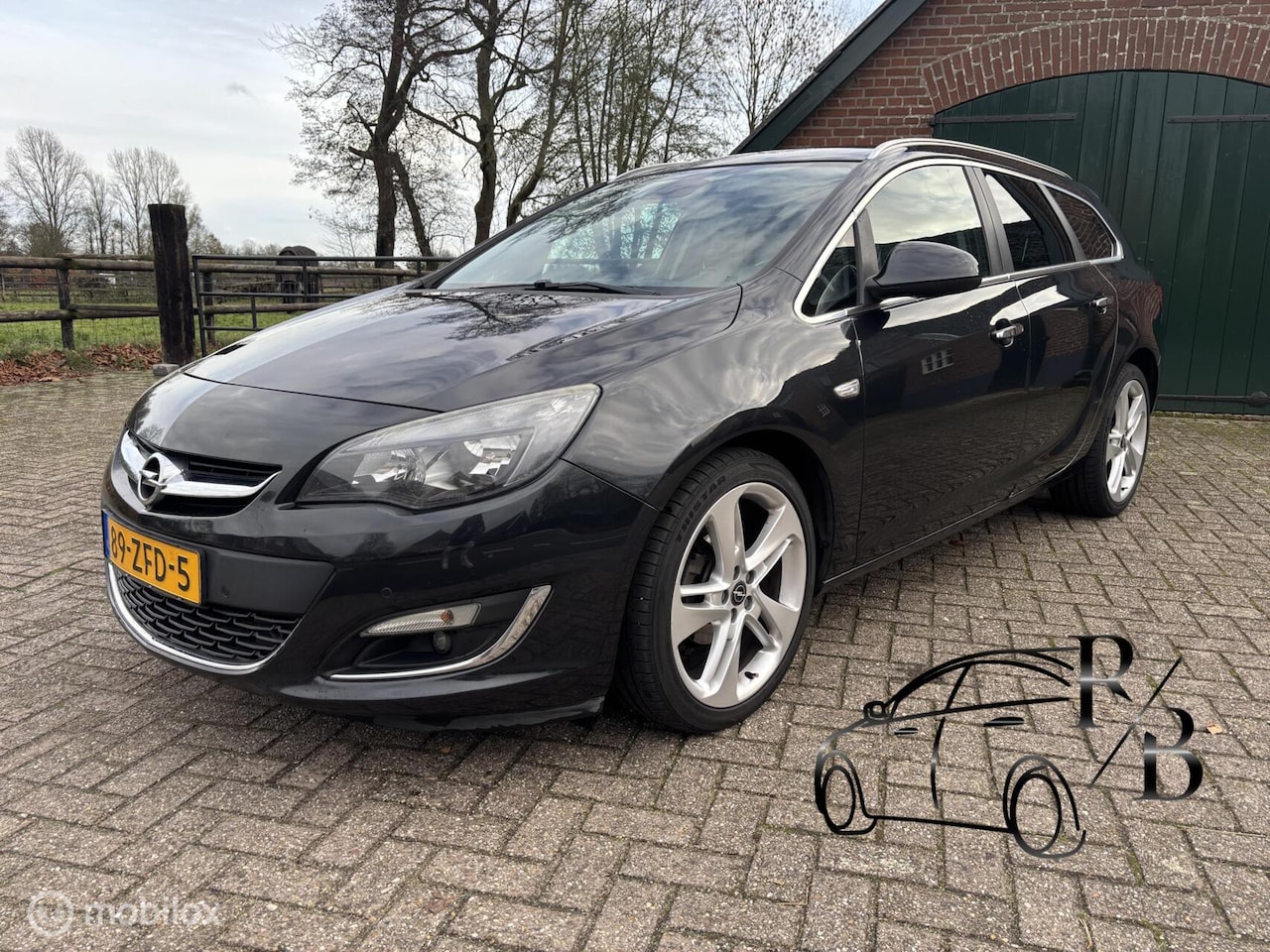 Opel Astra Sports Tourer - 1.4 Turbo LPG Cosmo 1.4 Turbo LPG Cosmo - AutoWereld.nl