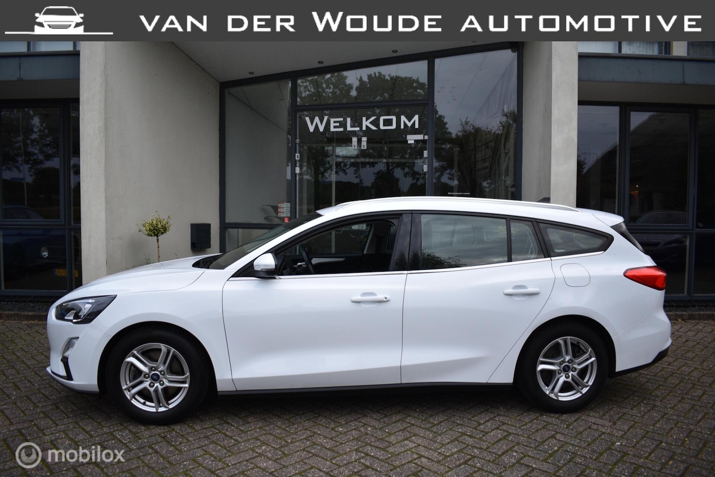 Ford Focus Wagon - 1.0 EcoBoost Hybrid Trekhaak AGR Navi|LED - AutoWereld.nl