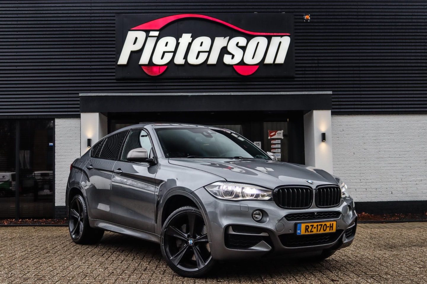 BMW X6 - M50d DEALER OH FACELIFT PANO 360 MEMORY H&K VOL OPTIE - AutoWereld.nl