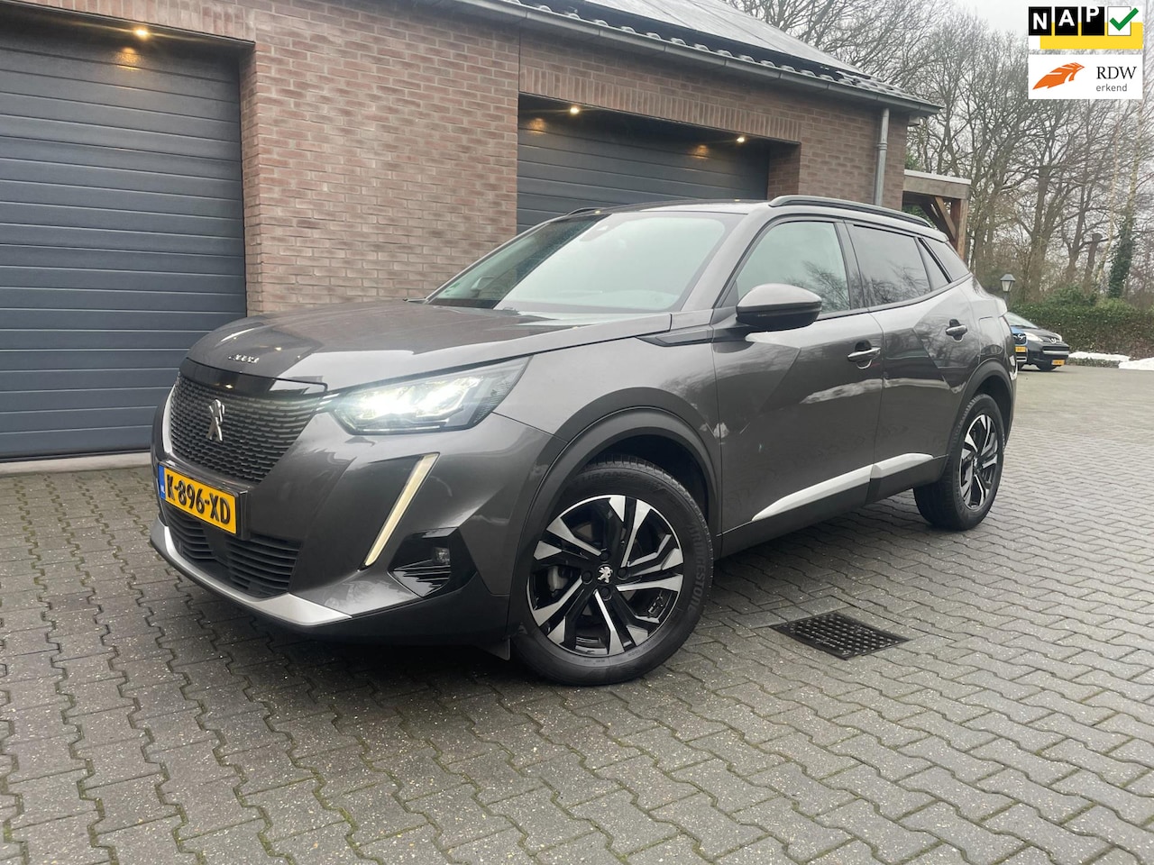 Peugeot 2008 - 1.2 PureTech Blue Lease Allure CARPLAY CAMERA 2021 - AutoWereld.nl