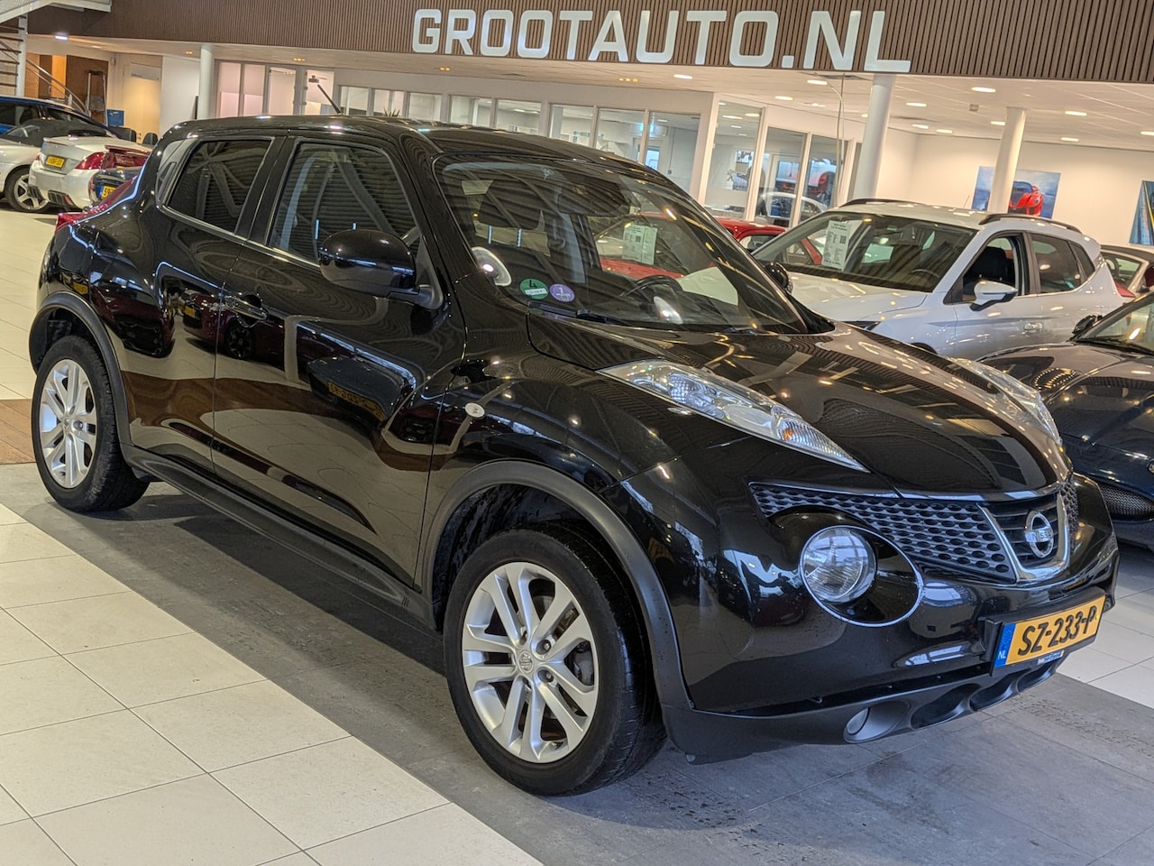 Nissan Juke - 1.6 DIG-T Tekna Airco, Cruise Control, Trekhaak, Stuurbekrachtiging - AutoWereld.nl