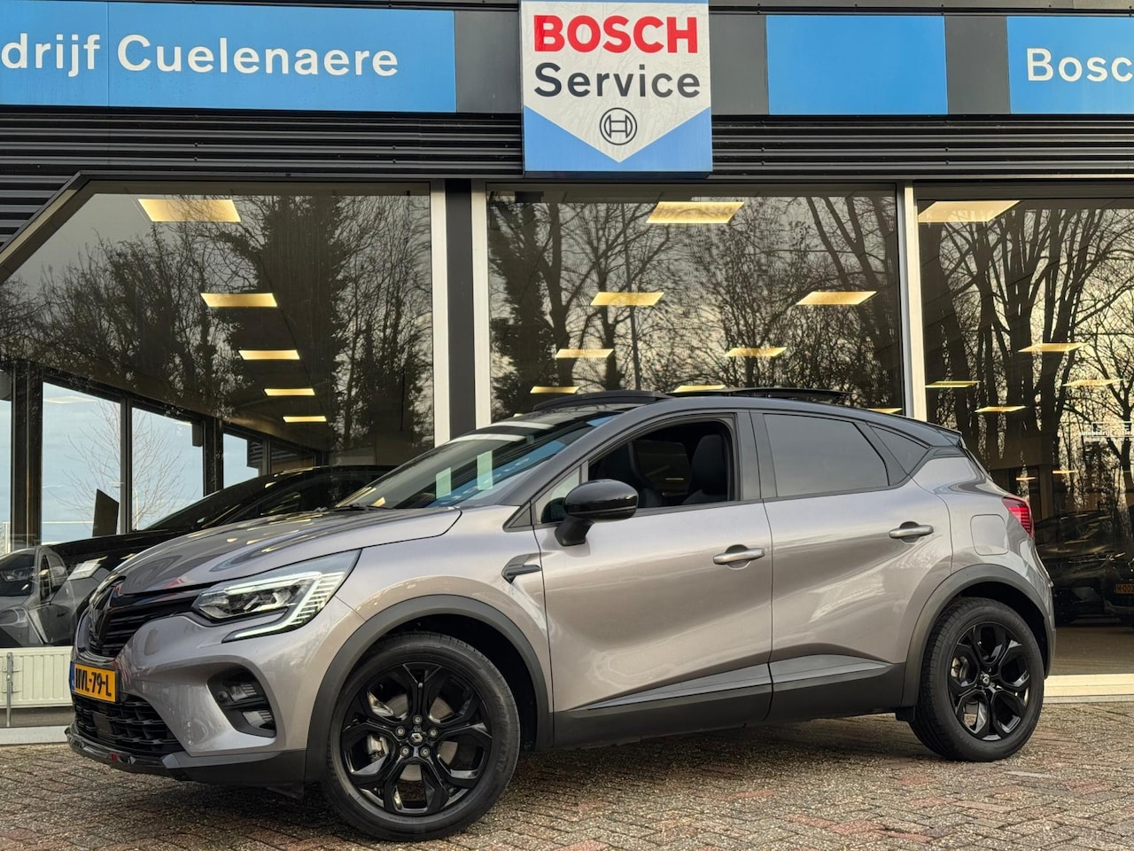 Renault Captur - 1.6 E-Tech plug-in hybrid 160 SL Rive Gauche Pano / Groot navi / Adapt. Cruise / Stuurwiel - AutoWereld.nl