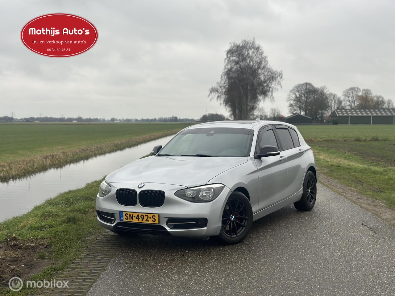 BMW 1-serie - 120d Business Automaat Navi Clima! - AutoWereld.nl