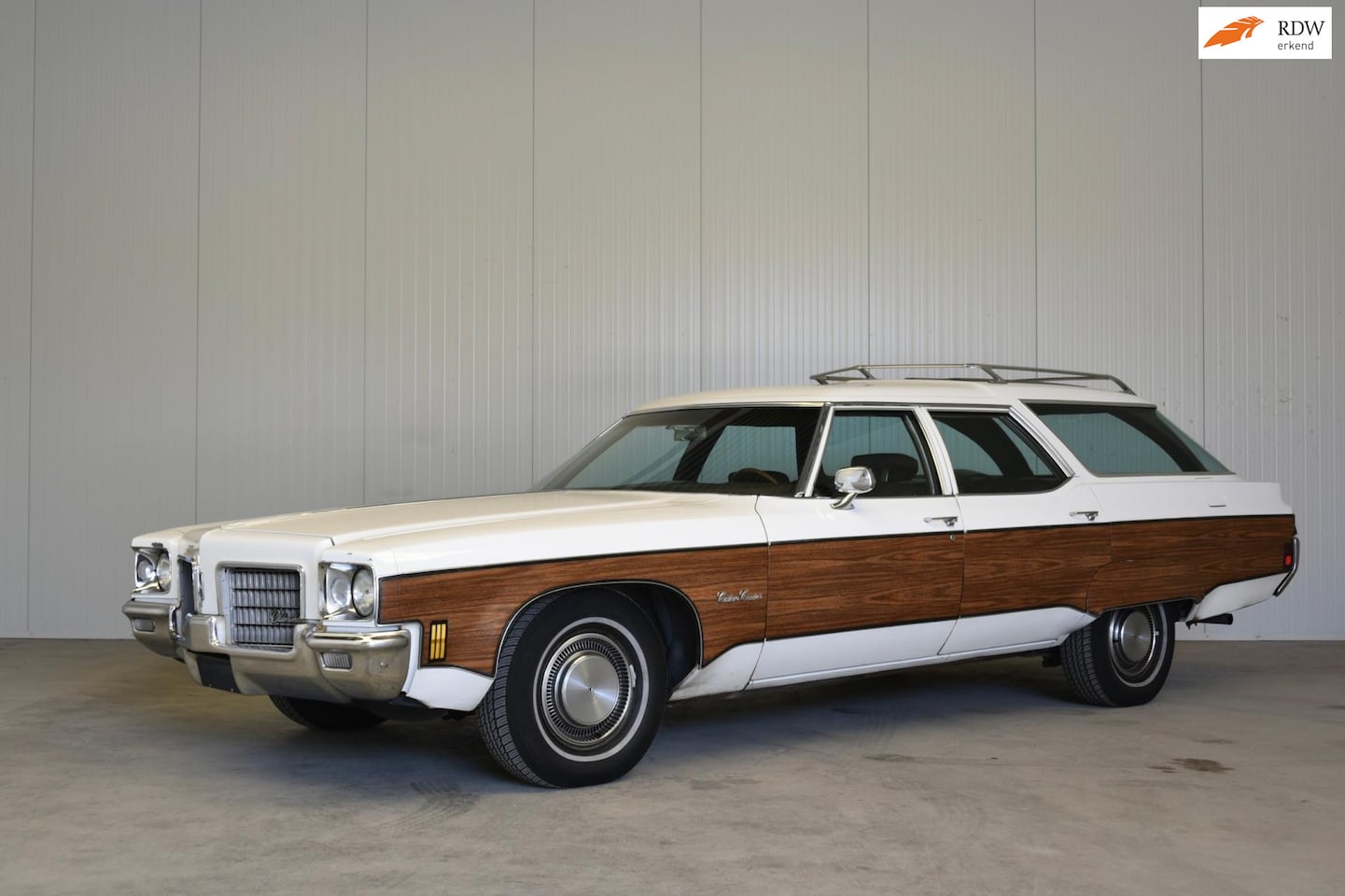 Oldsmobile Custom Cruiser - Met de wereld beroemde 455 Rocket en Clamshell, Uniek! - AutoWereld.nl