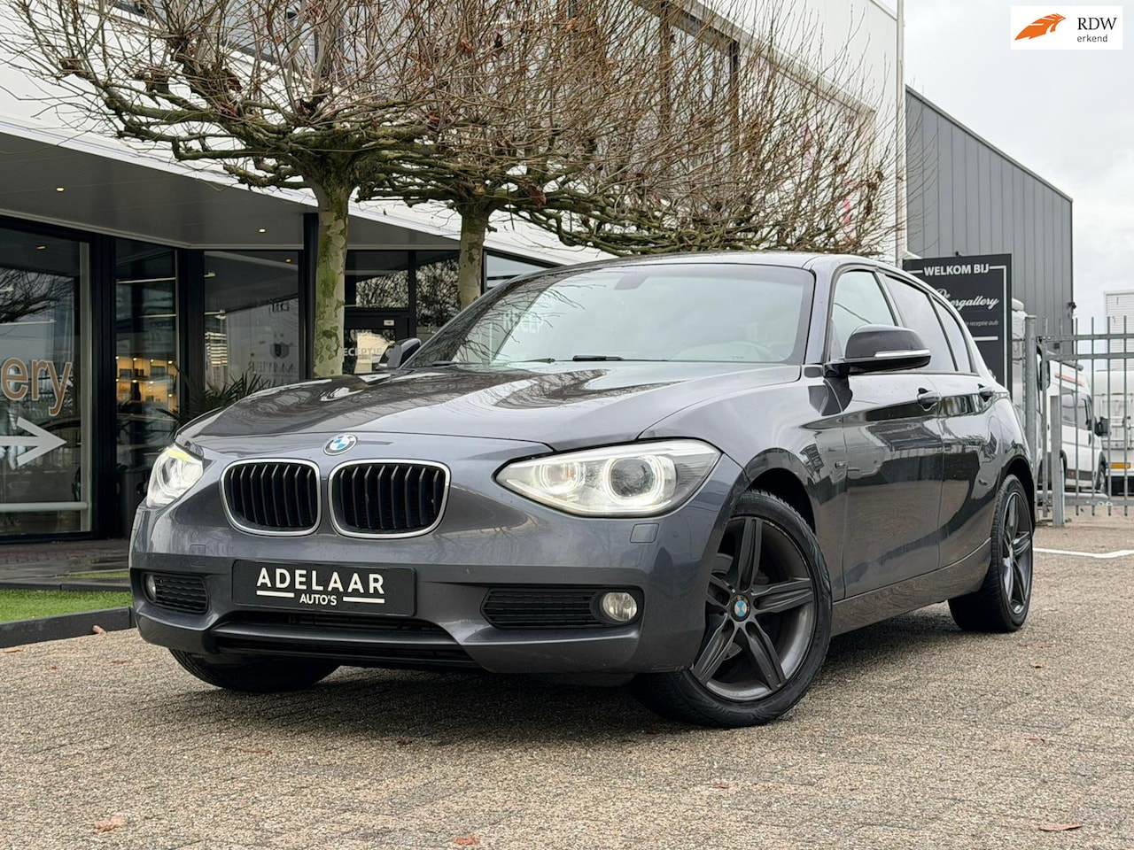 BMW 1-serie - 118i Business | XENON | NAVI | KEYLESS START | CRUISE | - AutoWereld.nl