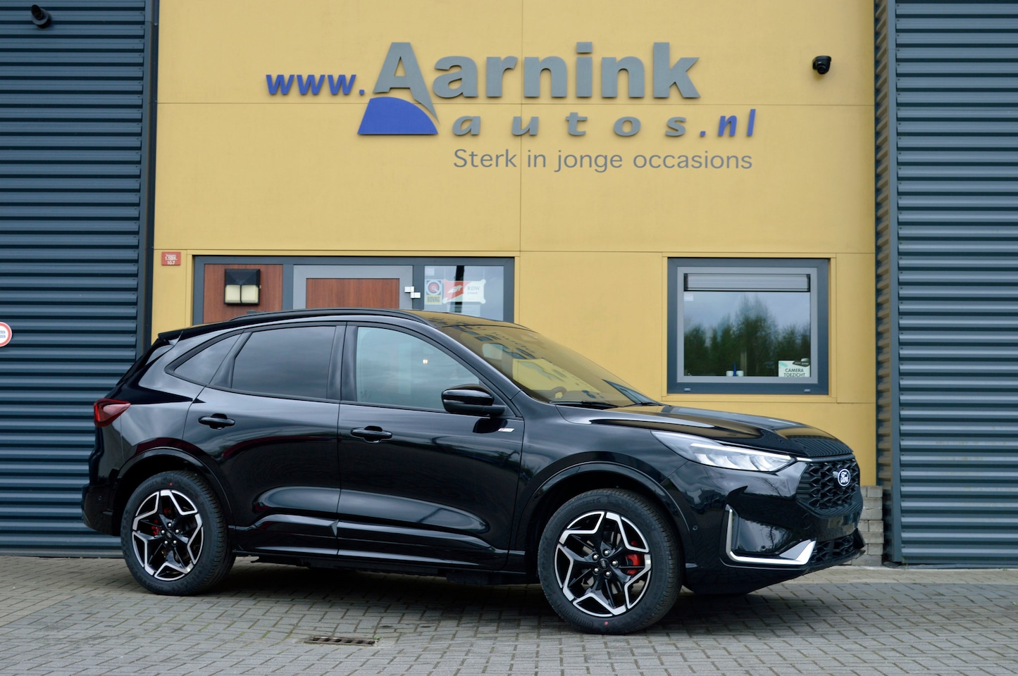 Ford Kuga - 2.5 Phev hybride 178 kw St-line X technopack, camera, winterpack, trekhaak, agr stoelen in - AutoWereld.nl