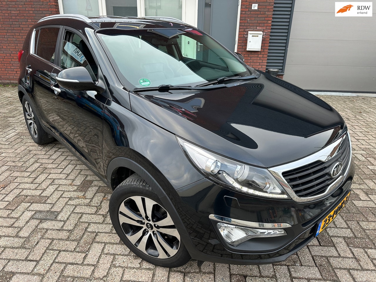 Kia Sportage - 2.0 X-clusive / Leder / Navi / Camera / PDC / NAP / Stoelverwarming - AutoWereld.nl
