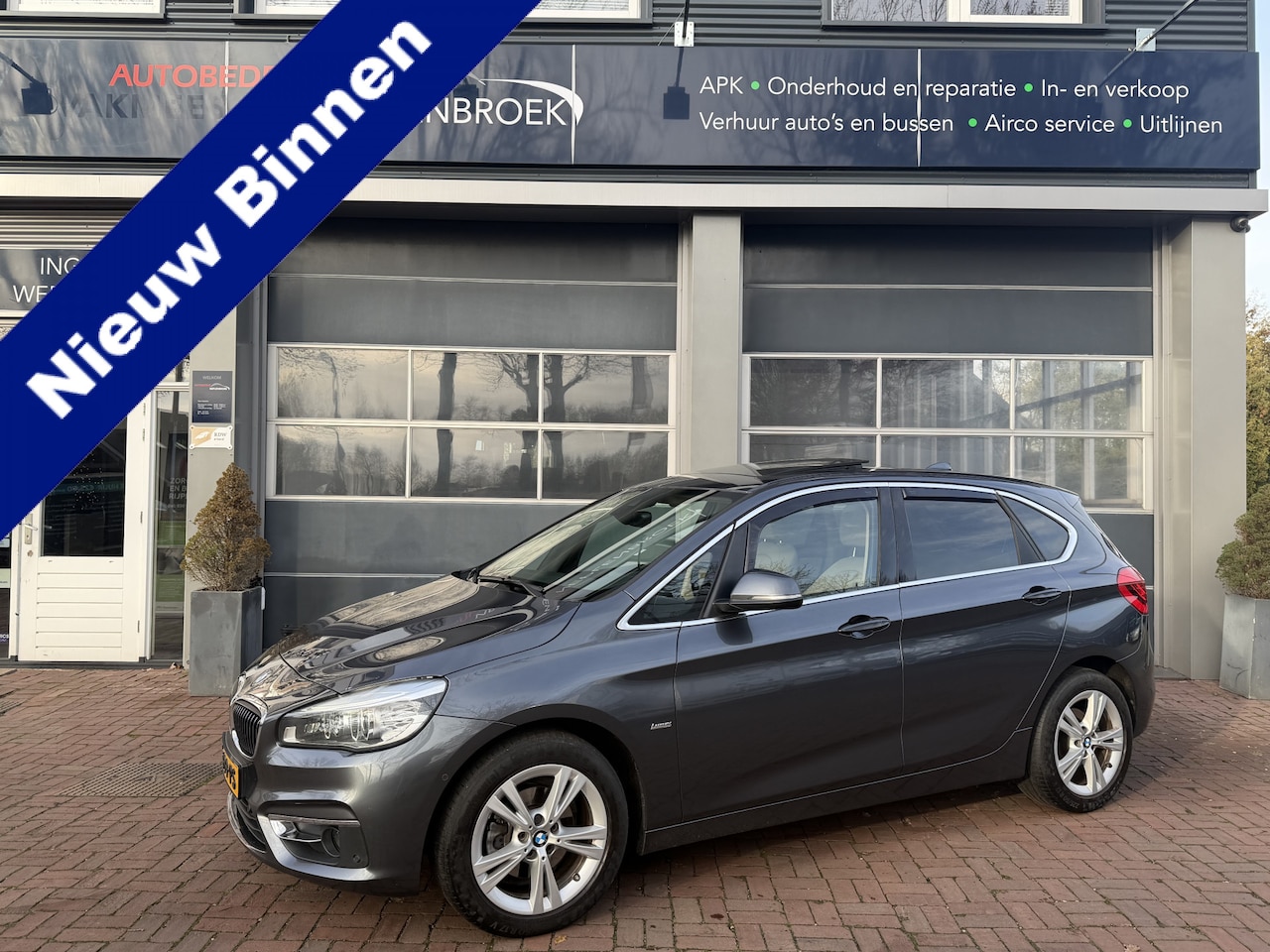 BMW 2-serie Active Tourer - 218d High Executive Automaat,Schuifdak,Leer,Navi,Clima,17Inch,Pdc,Cruise Hoge Zit 150pk - AutoWereld.nl