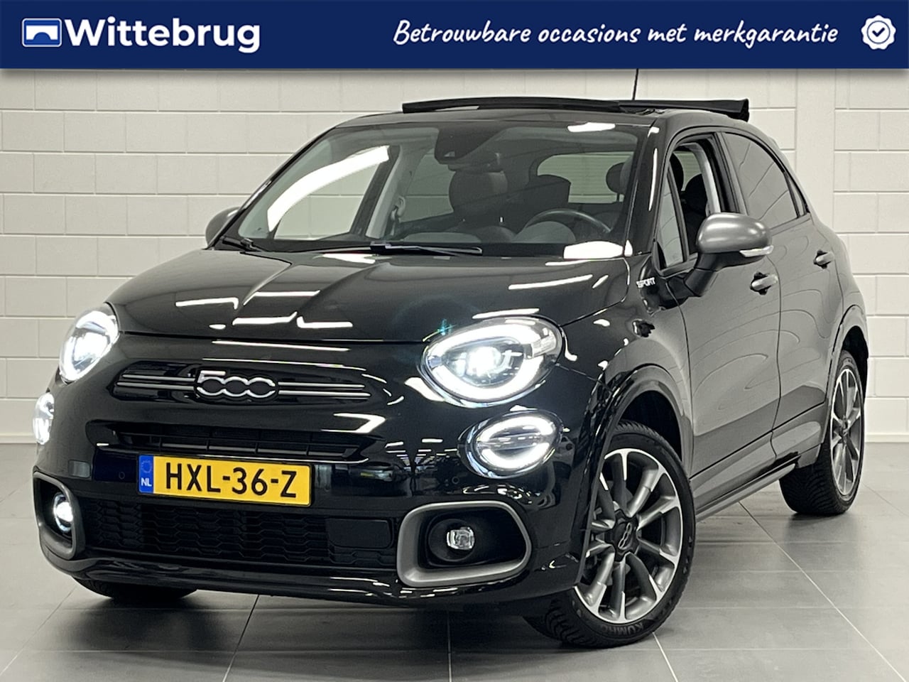 Fiat 500 X - 1.5 130PK Hybrid Sport Cabrio NAVIGATIE | OPEN DAK | PARKEERCAMERA | ALL SEASON BANDEN! - AutoWereld.nl