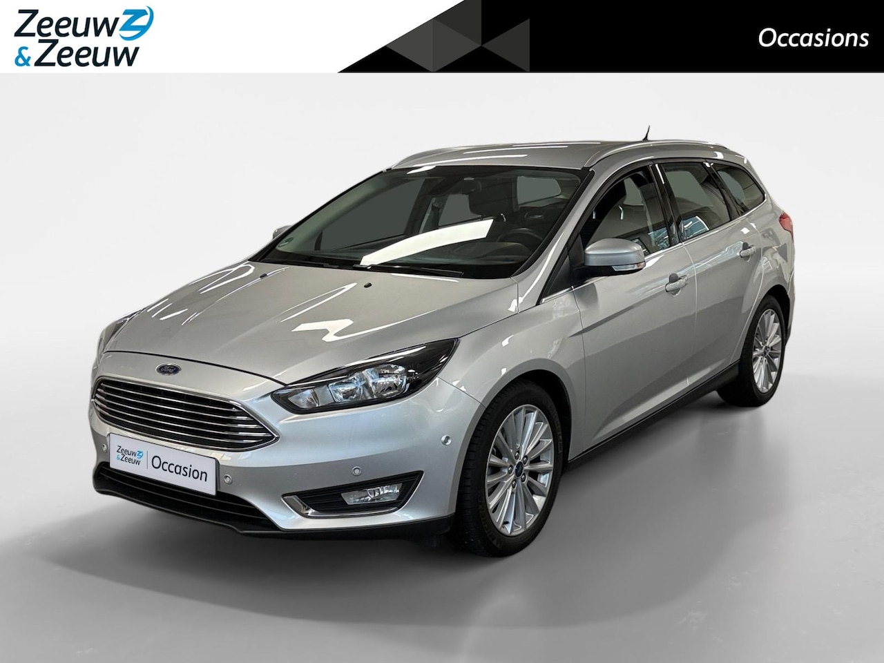Ford Focus Wagon - 1.0 Titanium NAVI AIRCO CAMERA PARKEERSENSOREN CRUISE CONTROLE TREKHAAK LM VELGEN PAS 4600 - AutoWereld.nl
