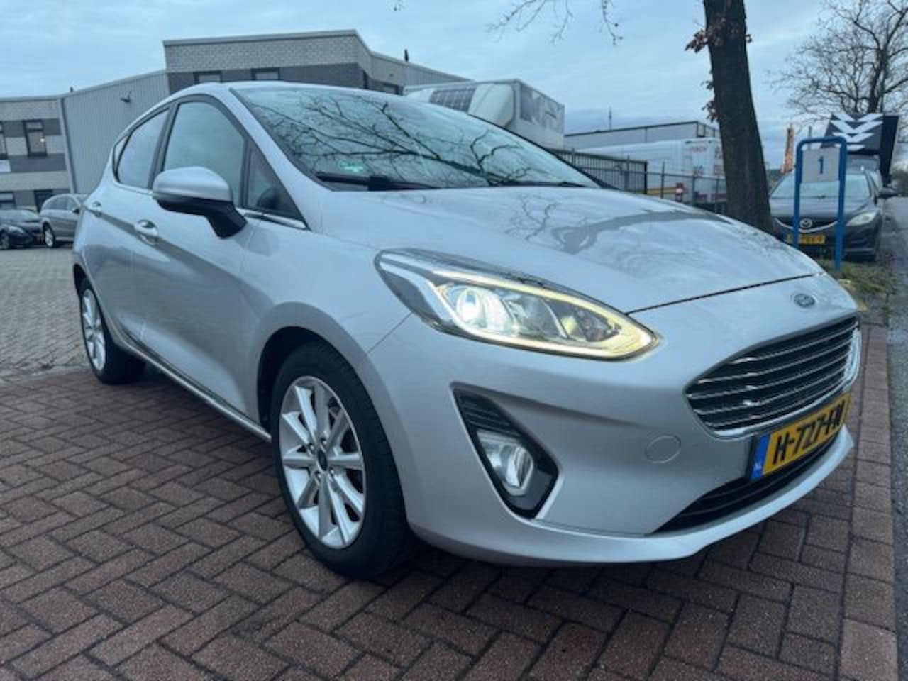 Ford Fiesta - 1.0 5deurs Titanium Airco/ECC,Navigatie,DAB Nette Auto - AutoWereld.nl