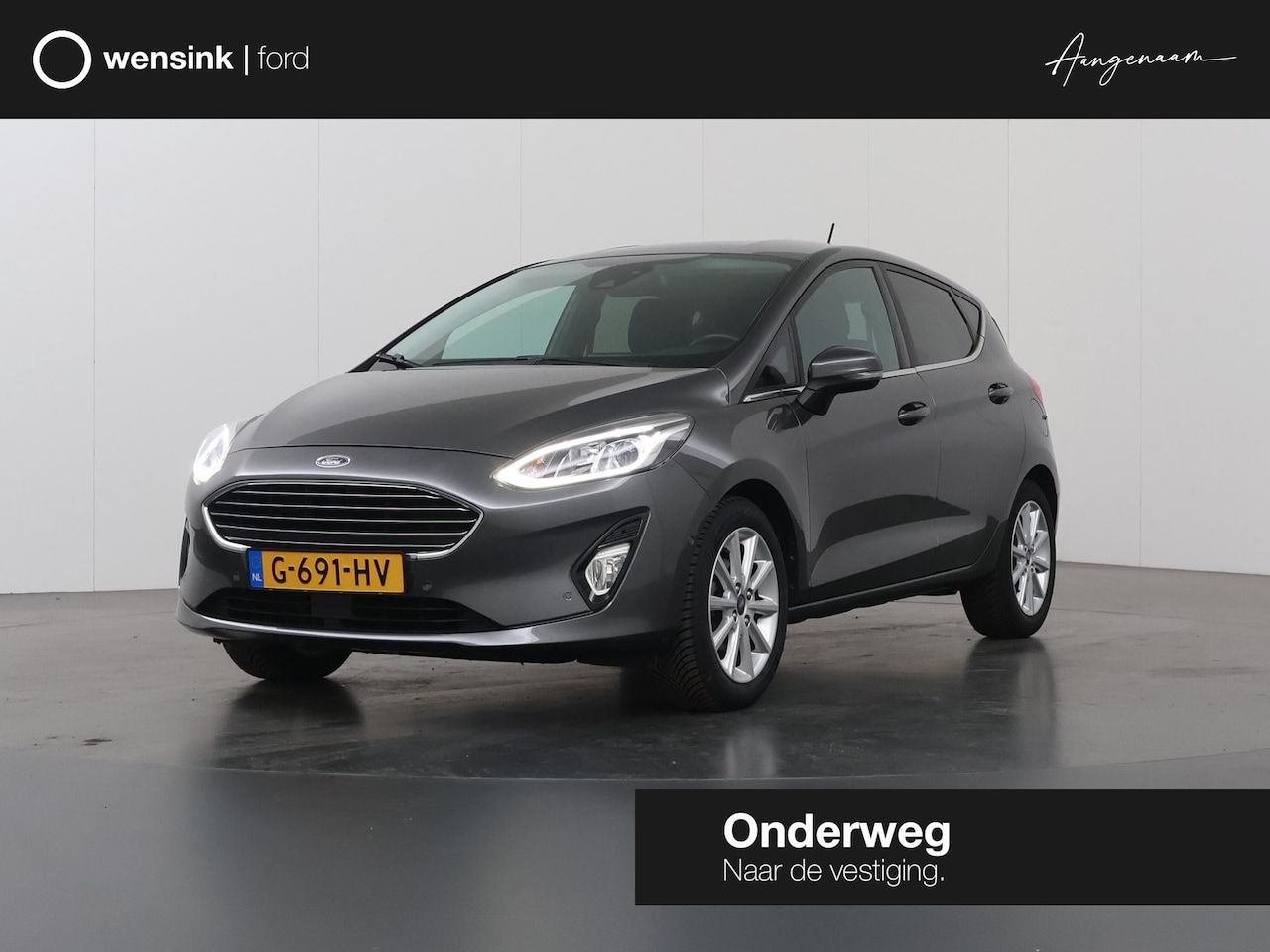 Ford Fiesta - 1.0 EcoBoost Titanium | Navigatie | Parkeercamera | B&O | Cruise Control Adaptief | - AutoWereld.nl