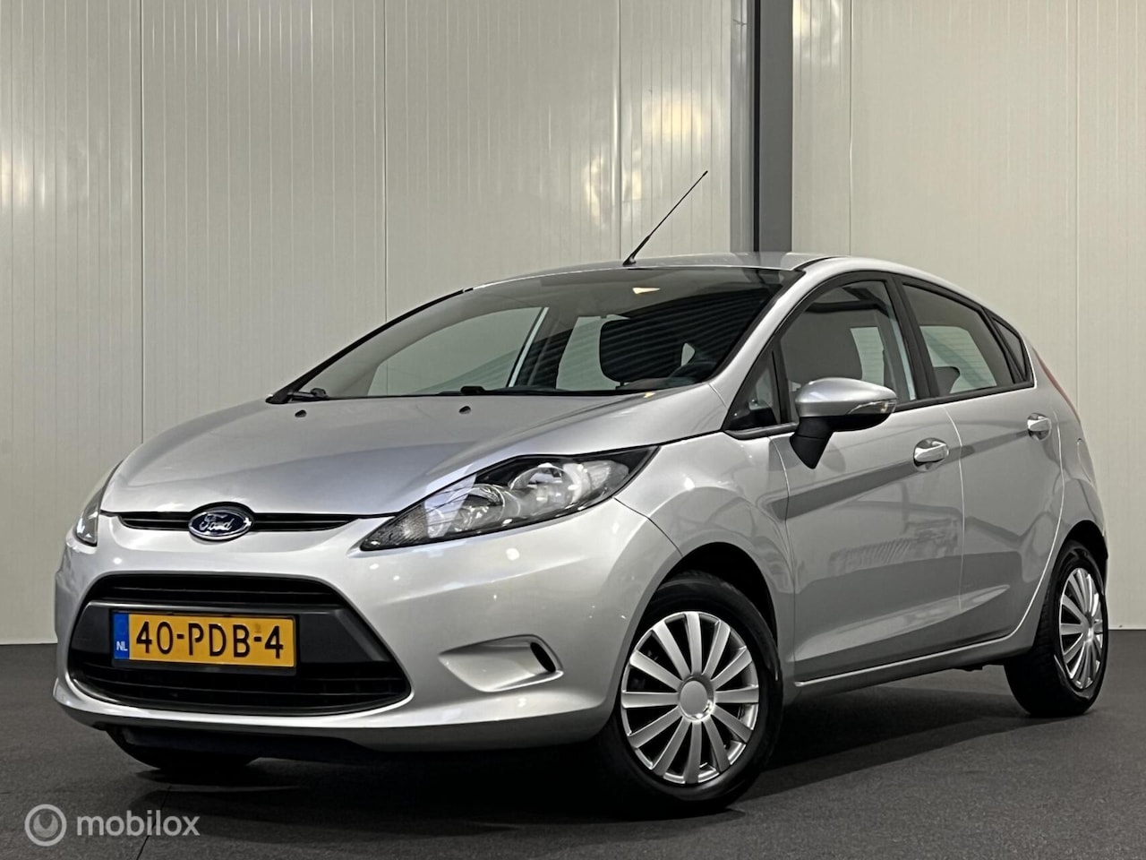 Ford Fiesta - 1.25 Limited 5-deurs [ NAP airco ] - AutoWereld.nl