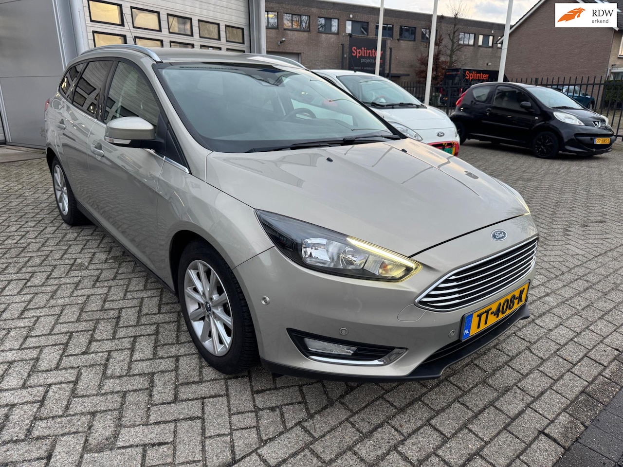 Ford Focus Wagon - 1.0 Titanium Edition Airco, Pdc, Cruise control - AutoWereld.nl