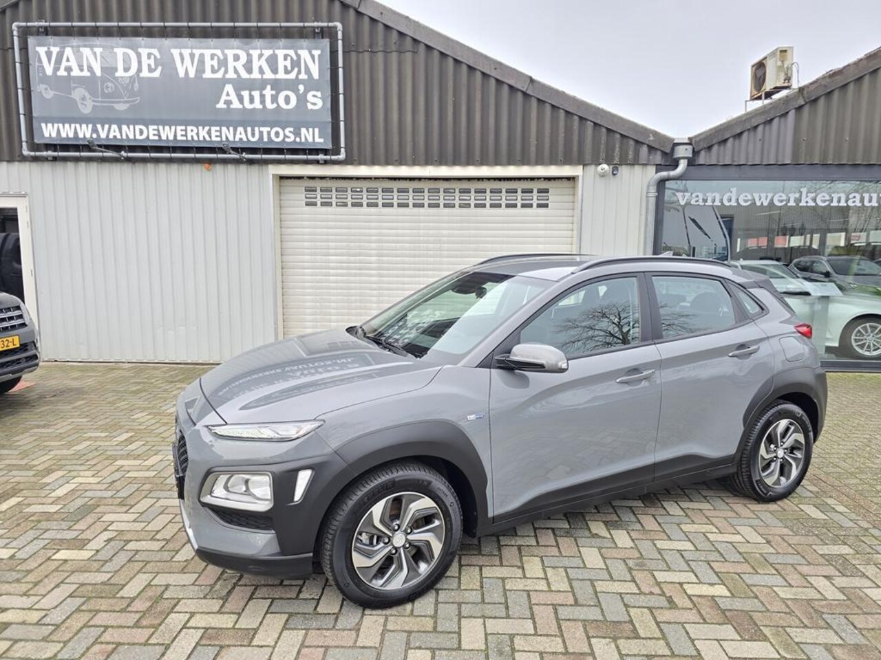Hyundai Kona - 1.6 GDI HEV Comfort AUTOMAAT Clima|Cruise|Camera|Trekhaak|Nap!!! - AutoWereld.nl