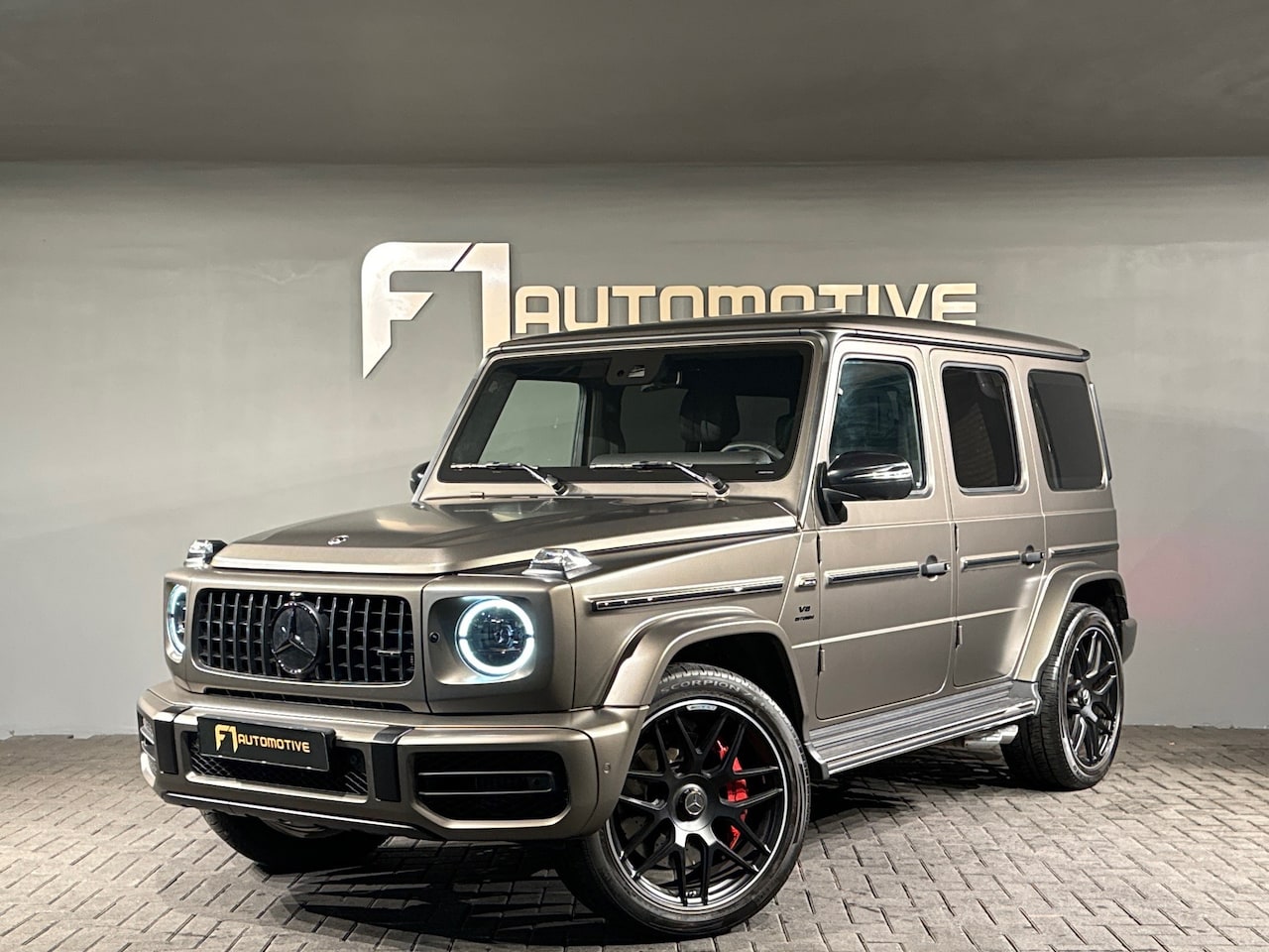 Mercedes-Benz G-klasse - AMG 63 Pano|Massage|Burmester|Trekhaak - AutoWereld.nl