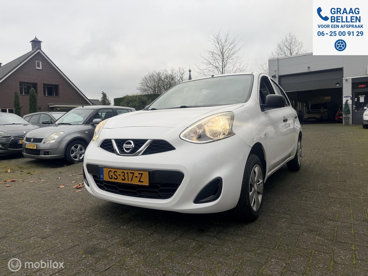Nissan Micra - 1.2 5 deurs Visia Pack Airco / BlueTooth / Elec ramen / NAP - AutoWereld.nl