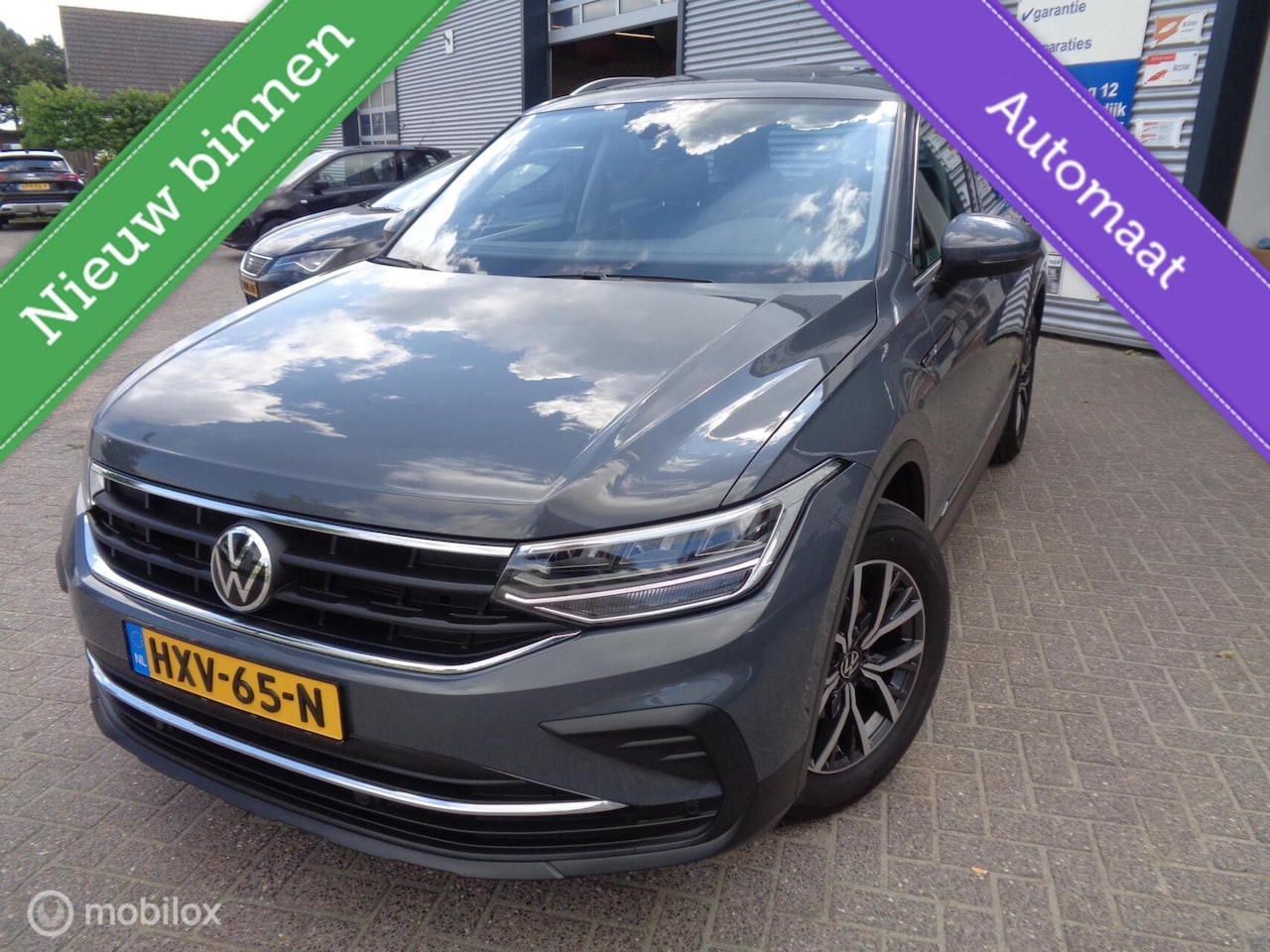 Volkswagen Tiguan - 1.5 TSI Elegance/Airco/Navi/Pano/Virtual/Leer/Memory/Stoel stuur verw/Trekhaak/Lm velgen/1 - AutoWereld.nl